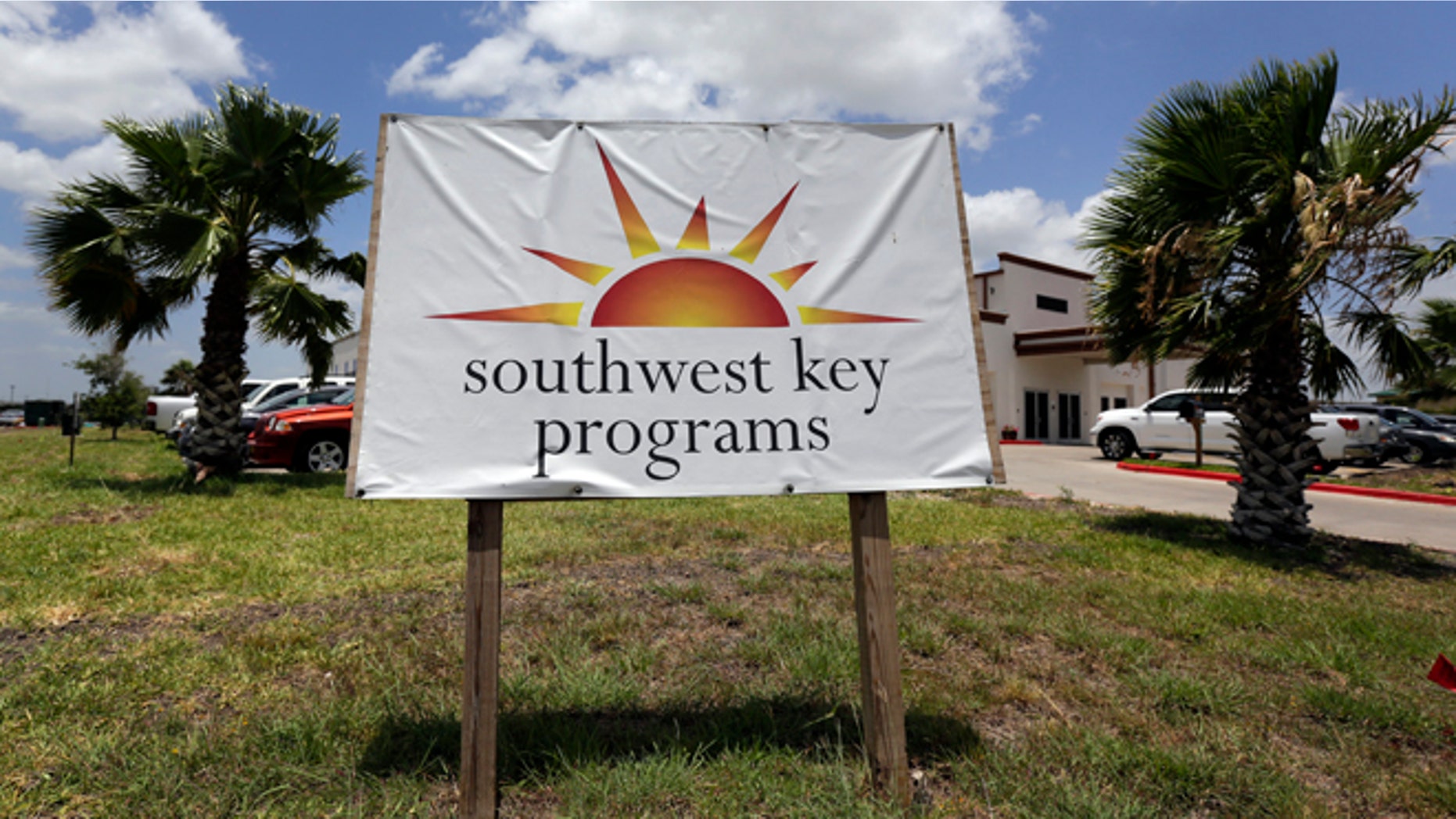This June 20, 2014 file photo shows the Southwest Key-Neva Esperanza, in Brownsville, Texas, a facility that shelters unaccompanied immigrant children. Overwhelmed by the arrival of thousands of unaccompanied immigrant children, the state of Texas relaxed its standards for the shelters that house them, easing rules governing how much space each child needs and what kind of facilities they should have. (AP Photo/Eric Gay, file)