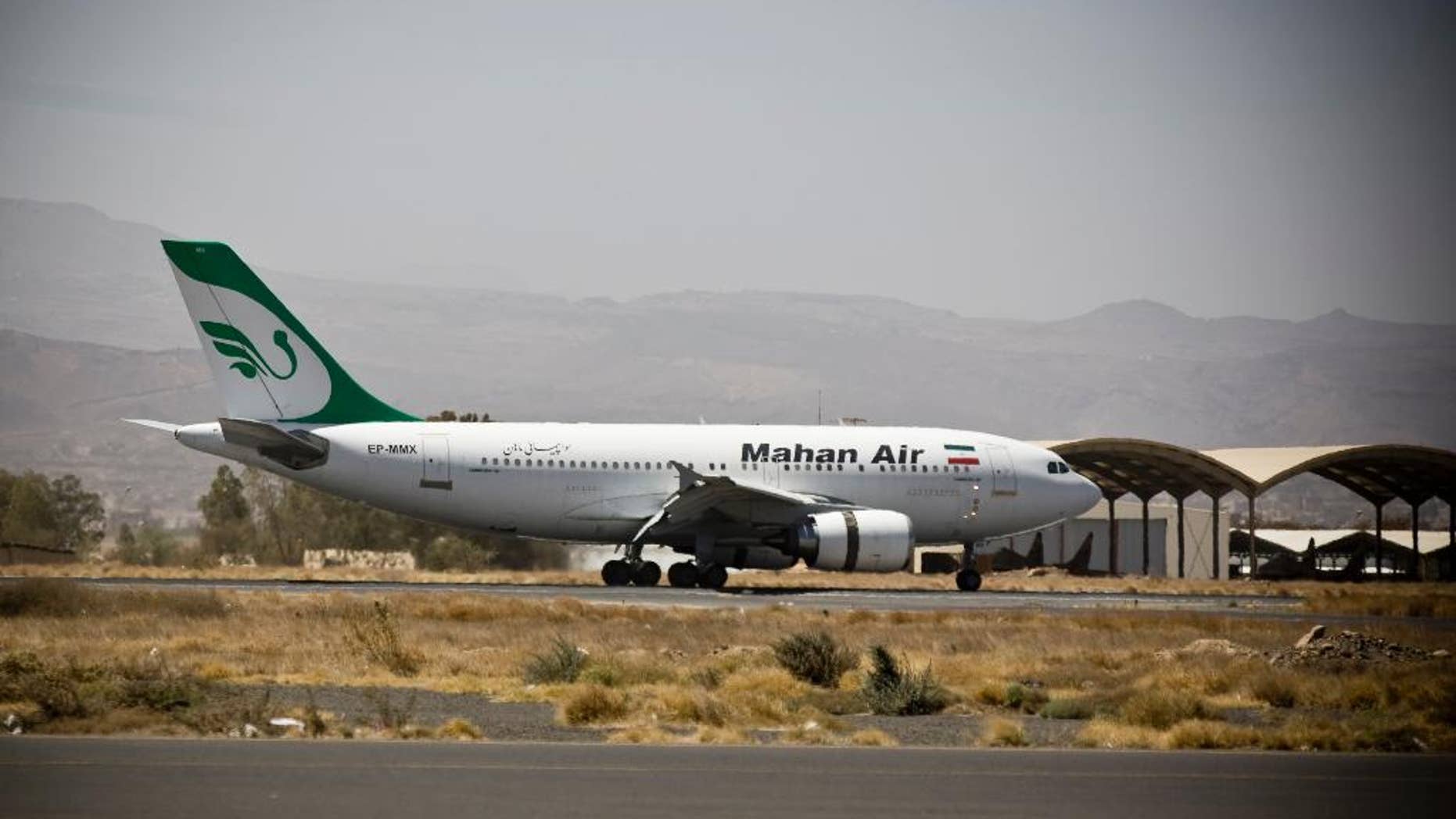 FILE -- A plane from the Iranian private airline, Mahan Air lands the international airport in Sanaa, Yemen, Sunday, March 1, 2015.
