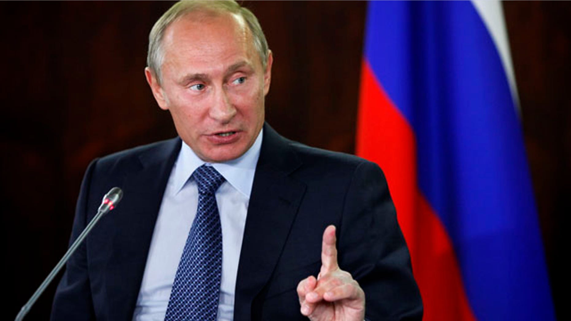 Sept. 21: Russian Prime Minister Vladimir Putin gestures while speaking at a meeting with activists of the Popular Front in Moscow.