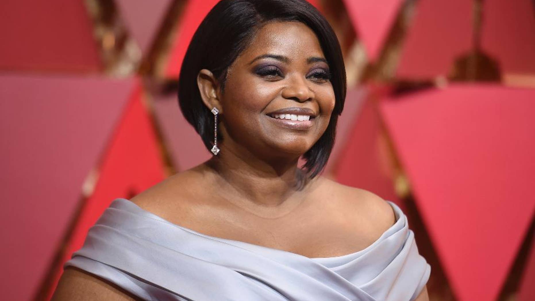 FILE - In this Sunday, Feb. 26, 2017, file photo, Octavia Spencer arrives at the Oscars on at the Dolby Theatre in Los Angeles. Kent State University's first universitywide commencement May 13 will get a touch of Hollywood as Spencer speaks to graduates of the northeastern Ohio school. Spencer recently starred as mathematician Dorothy Vaughan in the drama "Hidden Figures." (Photo by Richard Shotwell/Invision/AP, File)
