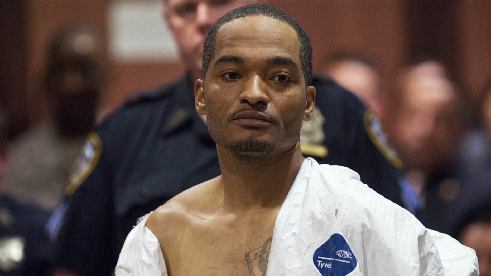 Suspect Demetrius Blackwell appears in court for his arraignment in Queens County Criminal Court in New York, May 3, 2015. Blackwell,wanted for illegal gun possession, was charged on Sunday with the attempted murder of a New York City plainclothes police officer who was shot in the head while pursuing the suspect in his unmarked car, authorities said. REUTERS/Theodore Parisienne/Pool - TM3EB531AA101