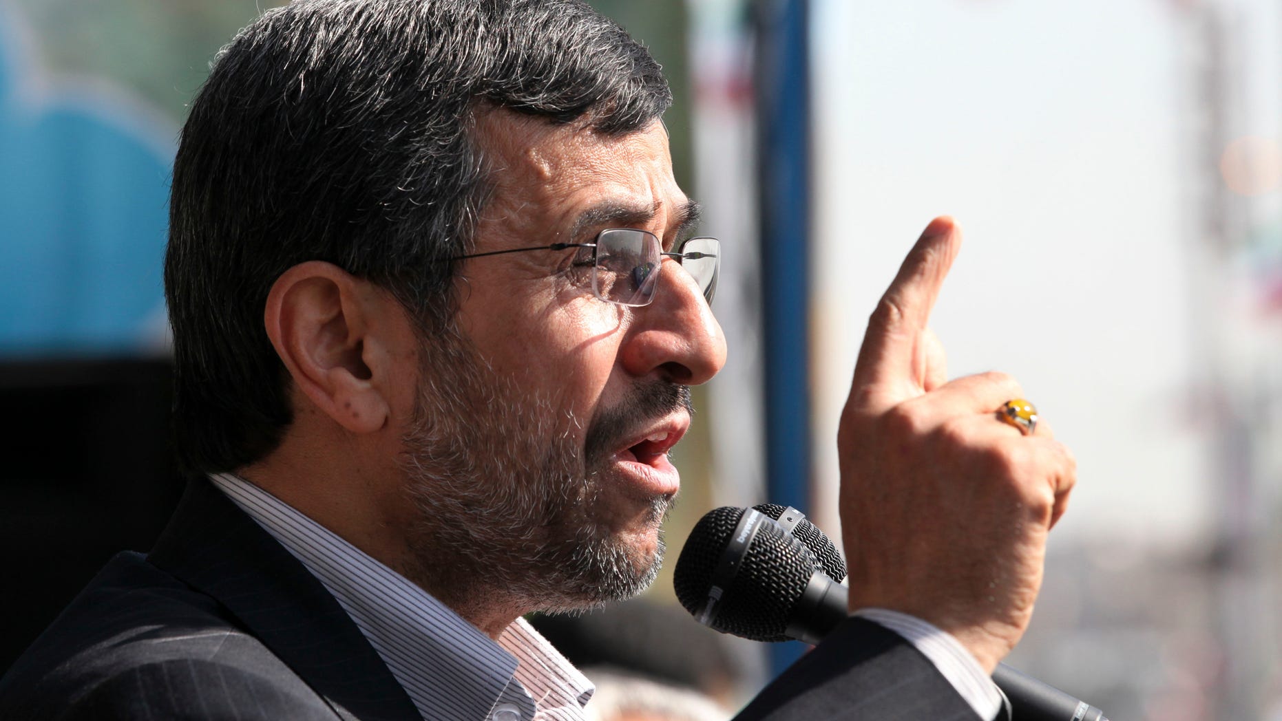 Iranian President Mahmoud Ahmadinejad, speaks during an annual rally commemorating the anniversary of the 1979 Islamic revolution, which toppled the late pro-U.S. Shah, Mohammad Reza Pahlavi, in Tehran, Iran, Sunday, Feb. 10, 2013. In his statements to the rally, Ahmadinejad said he is ready to have direct talks with United States if the West stops pressuring his country. (AP Photo/Vahid Salemi)