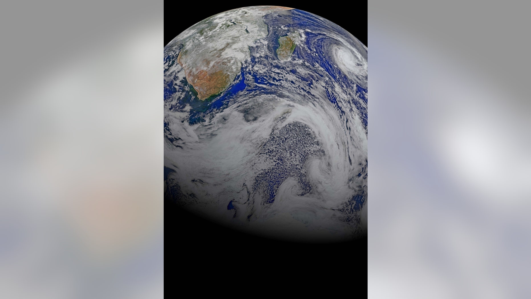April 9, 2015: This image provided by NASA Data from six orbits of the Suomi-NPP spacecraft on have been assembled into this perspective composite of southern Africa and the surrounding oceans. Tropical Cyclone Joalane is seen over the Indian Ocean. The image was created by the Ocean Biology Processing Group at NASA's Goddard Space Flight Center in Greenbelt, Maryland.