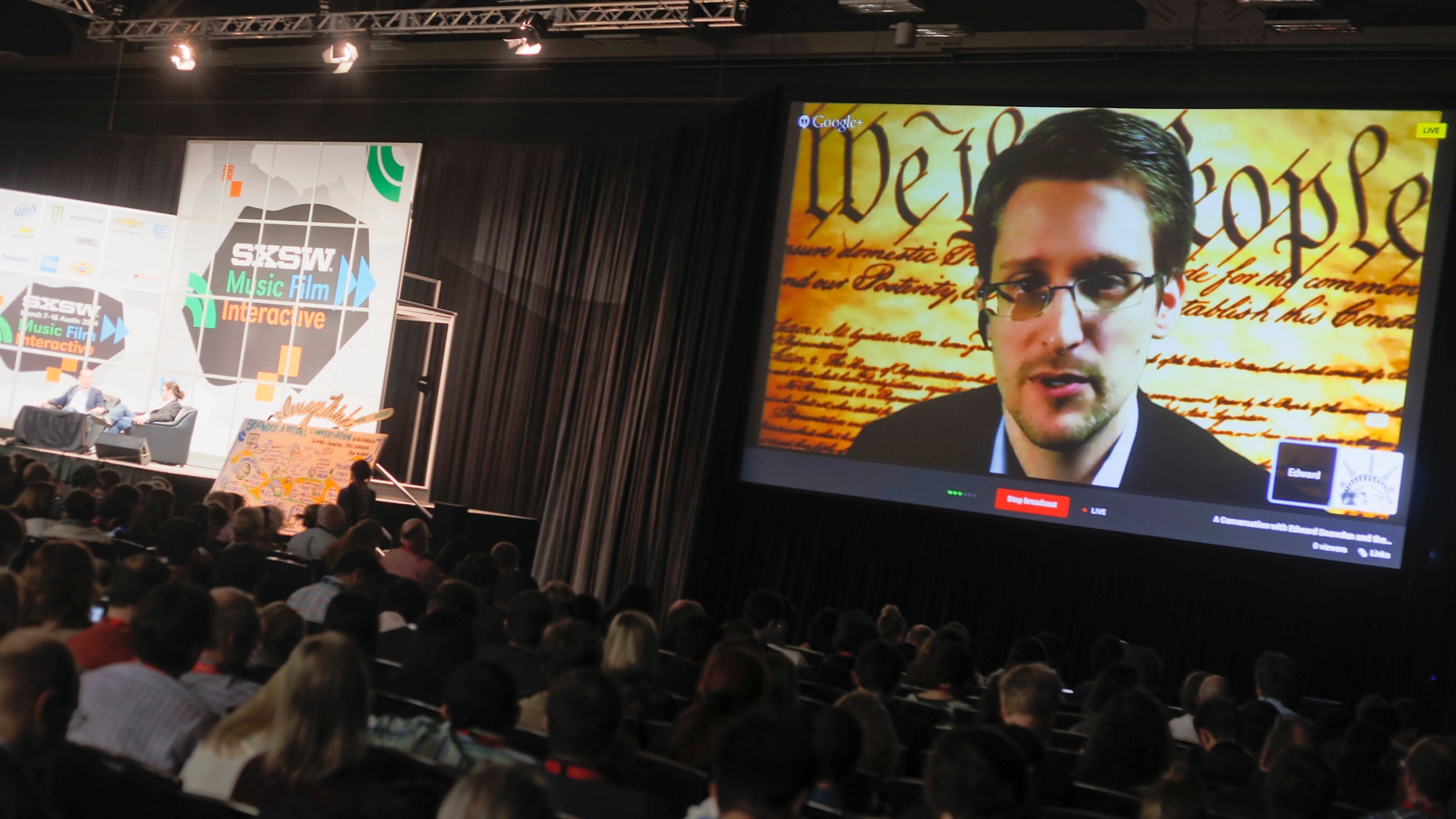 March 10, 2014: Edward Snowden talks during a simulcast conversation during the SXSW Interactive Festival on Monday, in Austin, Texas.