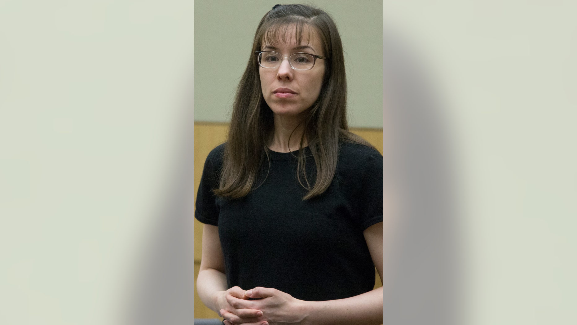 Defendant Jodi Arias stands while the jury enters the courtroom in her murder trial in Judge Sherry Stephens' Superior Court, on Monday, Feb 4, 2013. Arias stands trial accused of murdering her lover, Travis Alexander, in his Mesa home in 2008. (AP Photo/The Arizona Republic, Mark Henle)