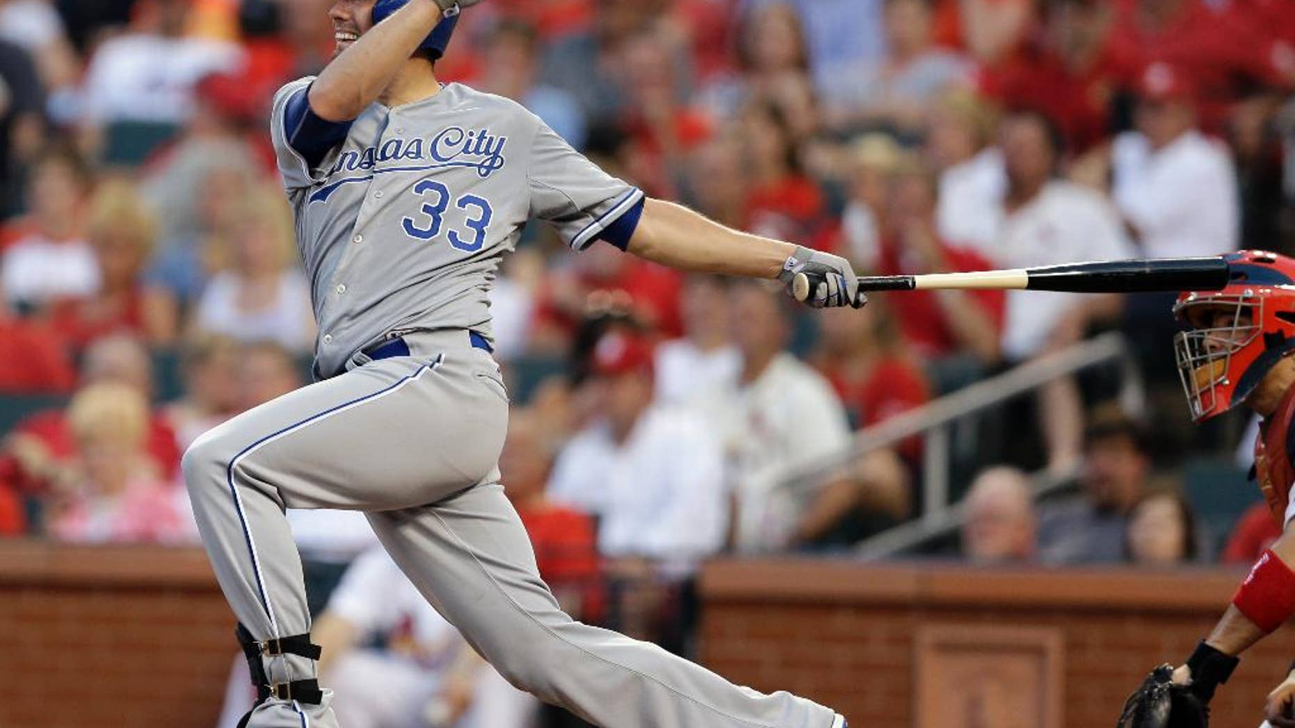 Kansas City Royals' James Shields follows through on an RBI double during the fifth inning of a baseball game against the St. Louis Cardinals Tuesday, June 3, 2014, in St. Louis. (AP Photo/Jeff Roberson)