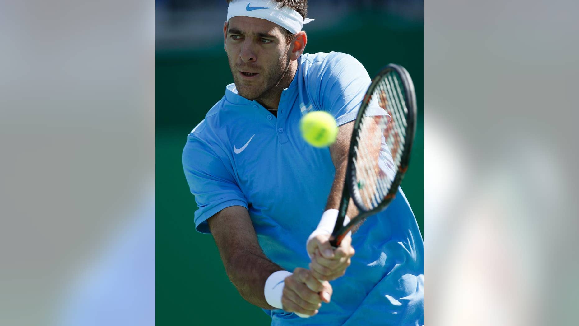 Argentina's Juan Martin del Potro returns Japan's Taro Daniel during the men's tennis competition at the 2016 Summer Olympics in Rio de Janeiro, Brazil, Thursday, Aug. 11, 2016. (AP Photo/Vadim Ghirda)