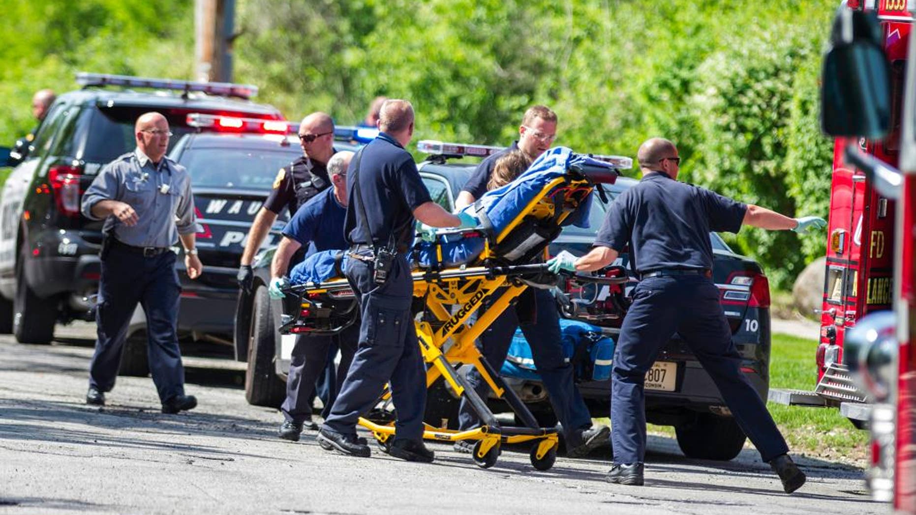 In this May 31, 2014 photo rescue workers take 12-year-old stabbing victim Payton Leutner to an ambulance in Waukesha, Wis. Two 13-year-old Wisconsin girls accused of stabbing Leutner to please online horror character Slender Man pleaded not guilty Friday. (AP)
