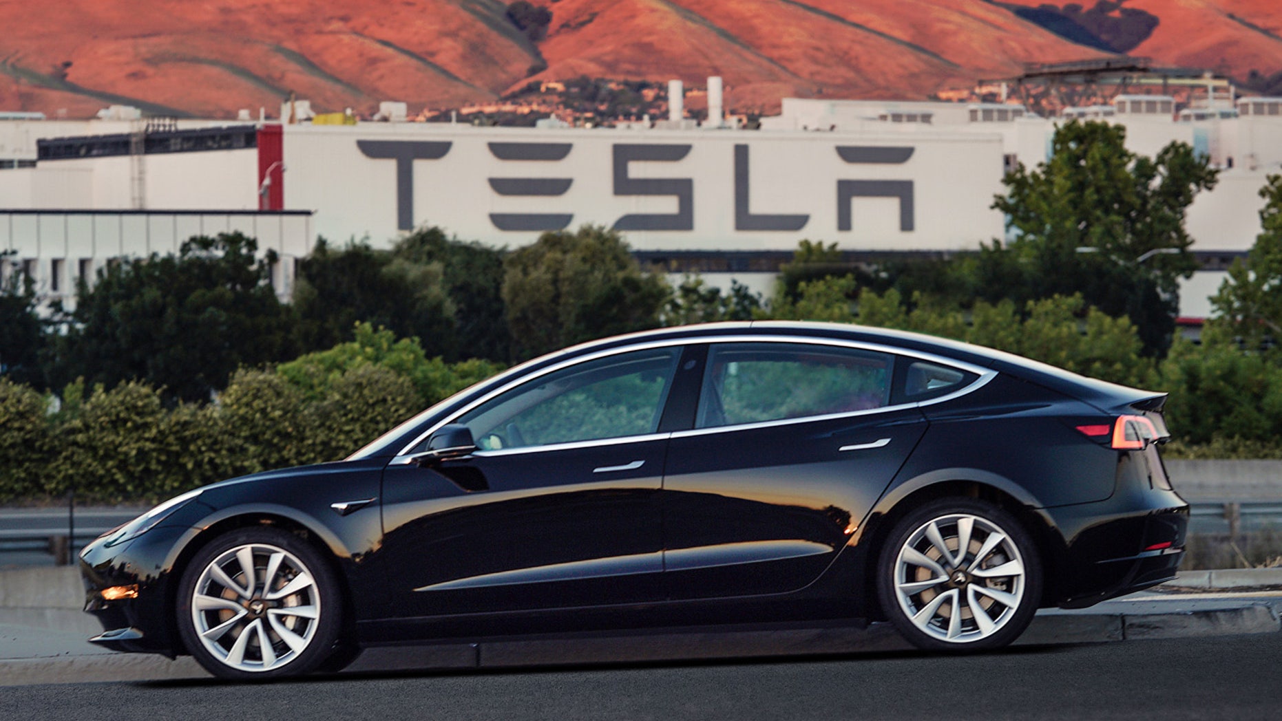 This undated image provided by Tesla Motors shows the Tesla Model 3 sedan.