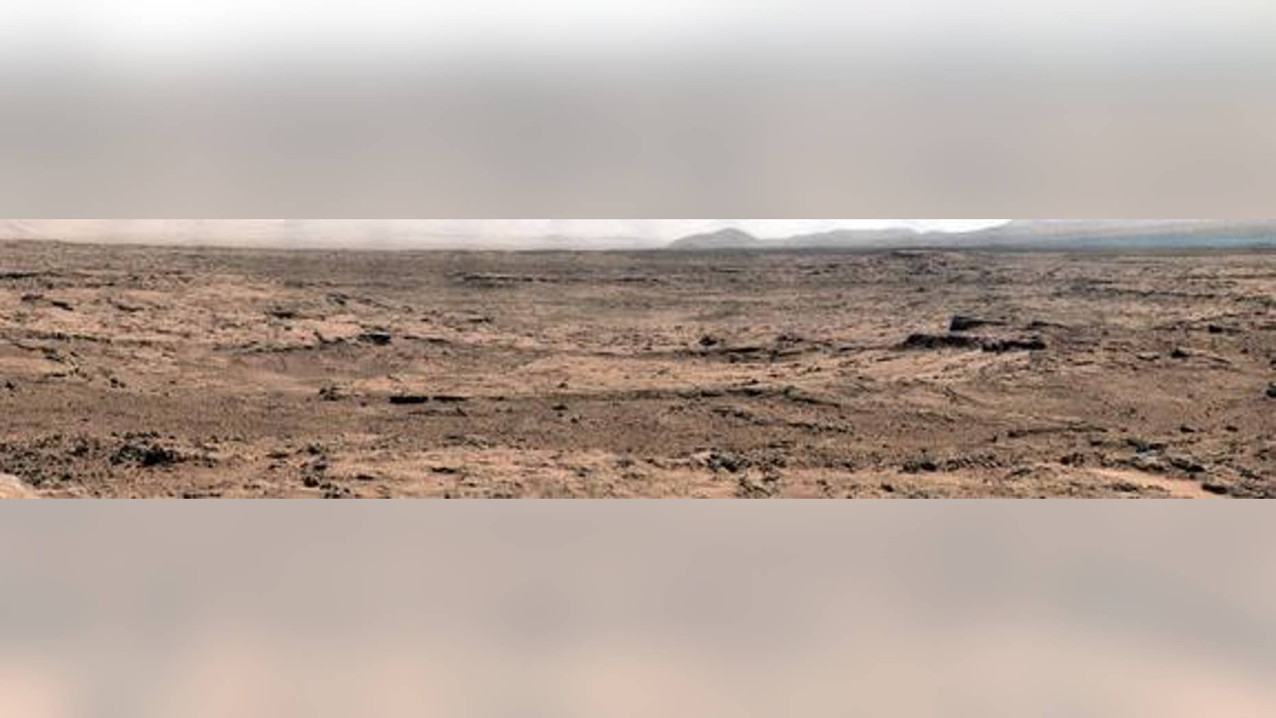 This panorama is a mosaic of images taken by the Mast Camera (Mastcam) on NASA's Mars rover Curiosity while the rover was working at a site called "Rocknest" in October and November 2012.