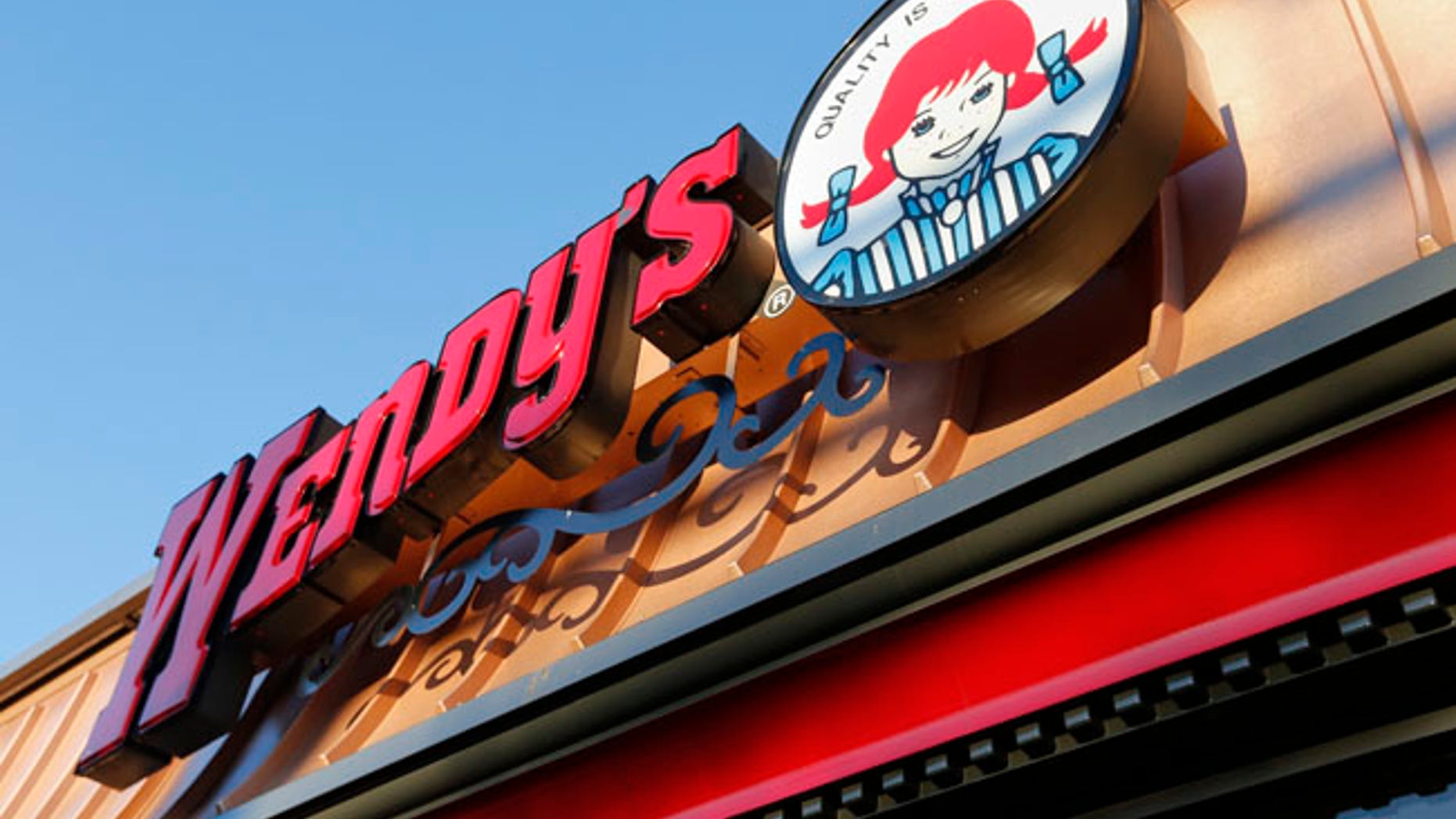 FILE - This Friday, March 21, 2014, file photo, shows a Wendy's restaurant in Providence, R.I. A Nevada teen's joke Twitter campaign to win a year of free chicken nuggets from Wendys may become the platforms most retweeted post of all time. Carter Wilkinson launched the effort on April 5, 2017. (AP Photo/Michael Dwyer, File)