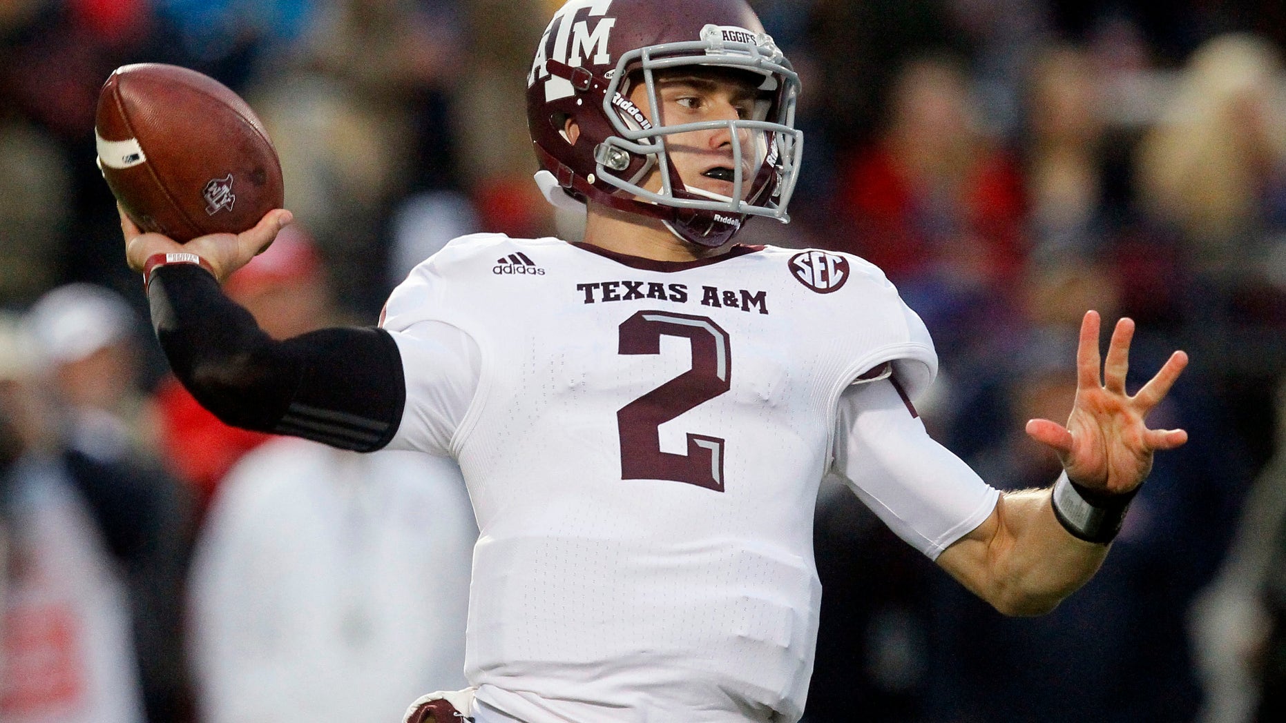 Oct. 6, 2012: Texas A&M quarterback Johnny Manziel throws a pass in the first quarter of an NCAA college football game against Mississippi in Oxford, Miss.