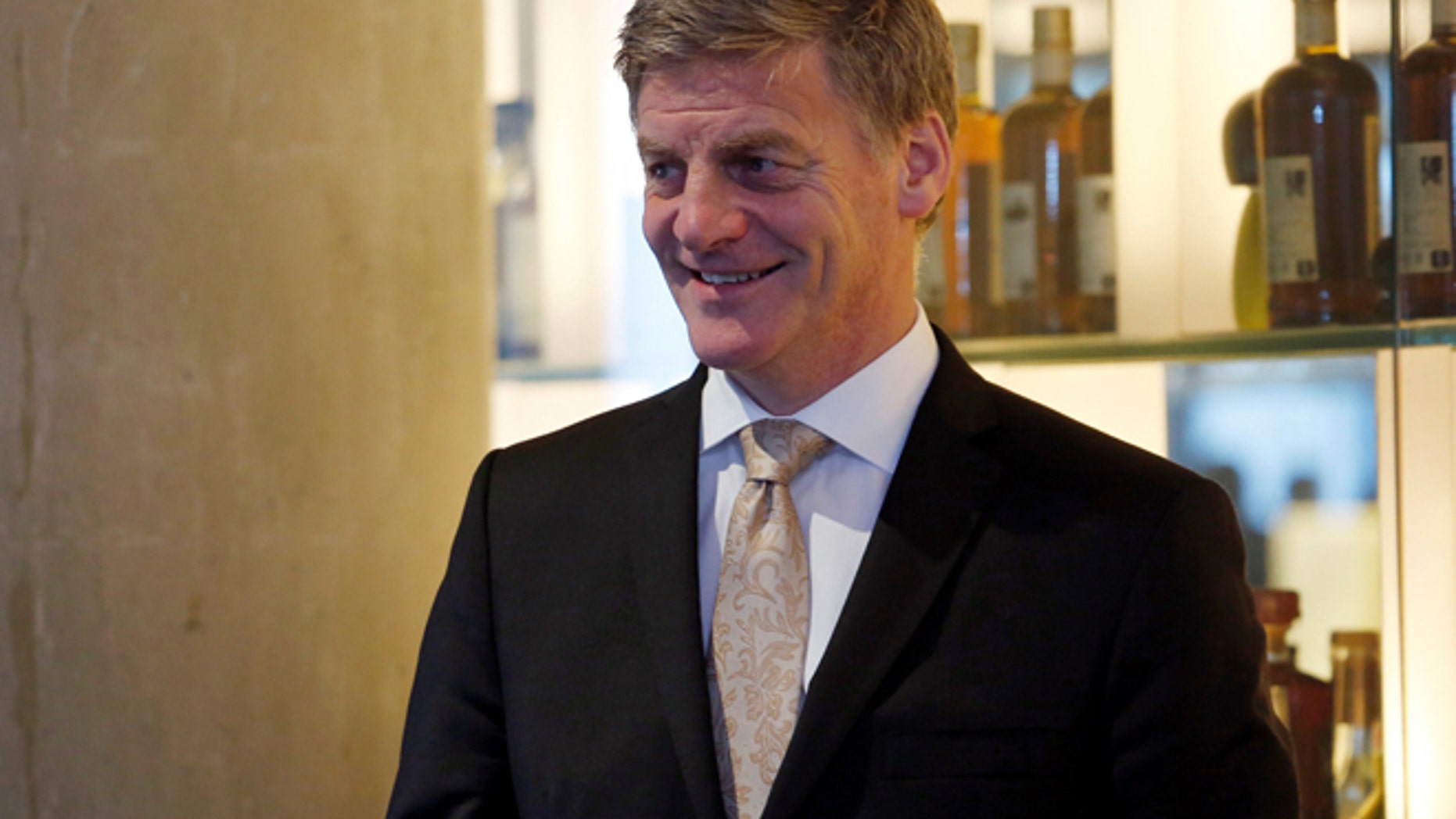 FILE: New Zealand Prime Minister Bill English attends an event to promote a New Zealand lamb product at a restaurant in Hong Kong