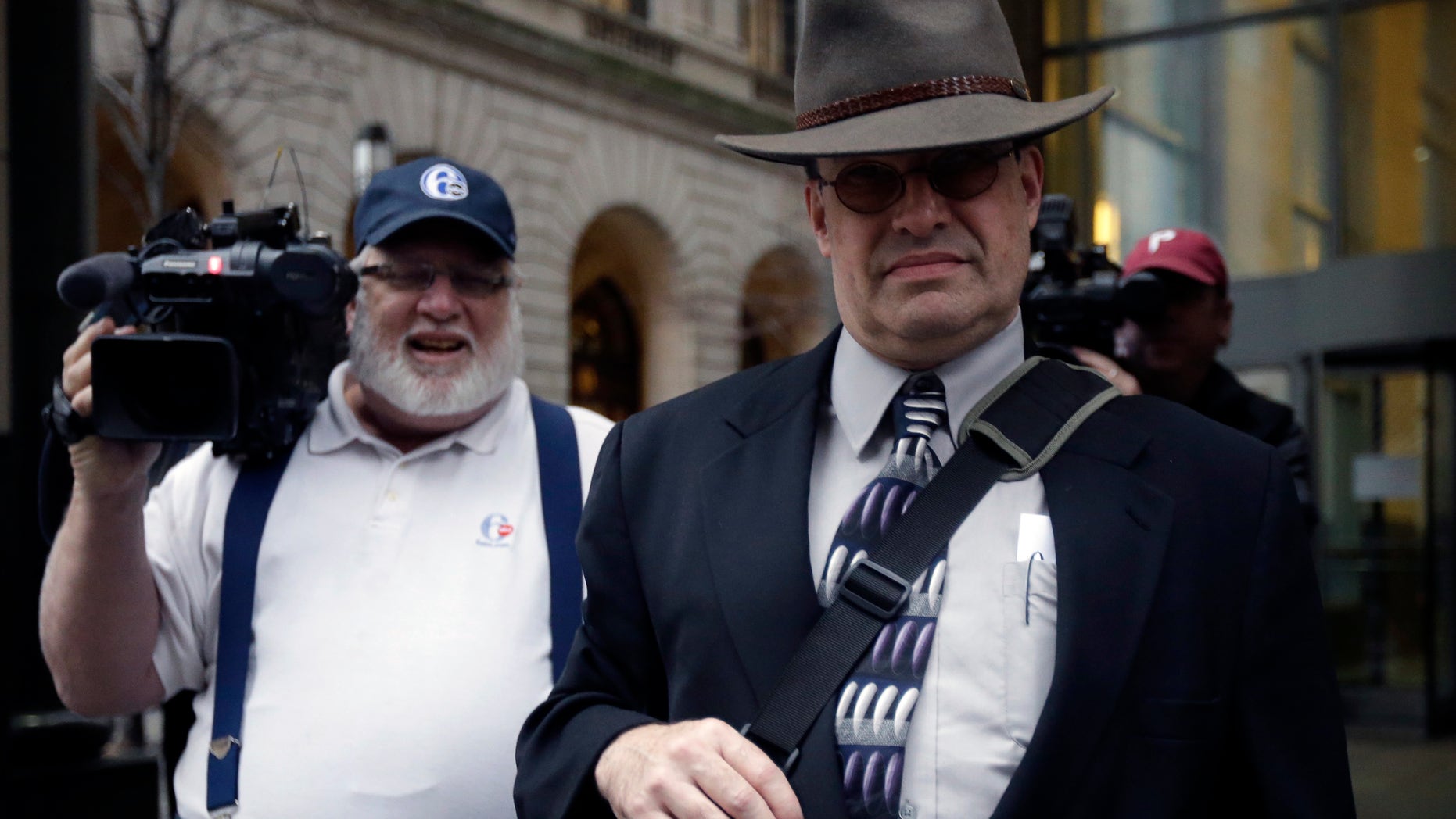 Former teacher Bernard Shero walks from the Criminal Justice Center, Monday, Jan. 14, 2013, in Philadelphia. Shero is charged with sexual assaulting an altar boy in northeast Philadelphia in the late 1990s. Shero has pleaded not guilty. (AP Photo/Matt Rourke)