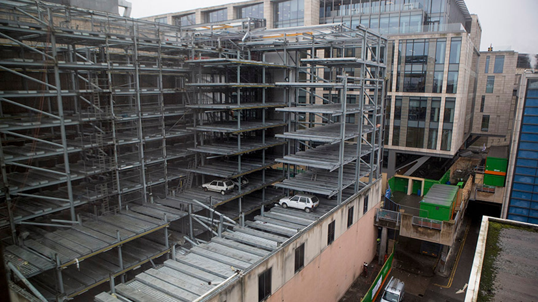 Cars found trapped in Edinburghâs ârobot car parkâ 15 years after "SkyPark" closed in 2003. Vehicles imprisoned in a disused robotic car park for more than a decade are set to be preserved by demolition crews after work to redevelop the building got underway. Jan 23 2018. See Centre Press story CPCARS; Eight vehicles stuck in a disused robotic car park for more than a decade will be preserved by demolition crews. The £5 million Autosafe "SkyPark" was hailed as Britainâs "most technologically advanced car park" when it opened in Edinburgh in 2001. But the tenure of the car park was short-lived after the company that operated it went into receivership in 2003. It was rumoured at the time that administrators had simply arrived one day to lock the doors, leaving dozens of cars trapped inside. And now, new pictures from a building opposite the site in the centre of Edinburgh show a "time capsuleâ with vehicles which look to be models from the late 1990s.