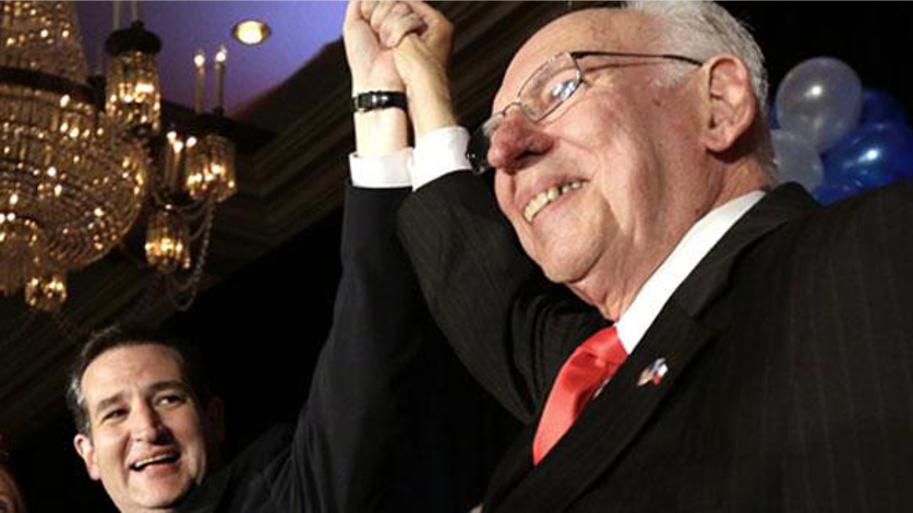 U.S. Sen. Ted Cruz, left, with his father, Rafael, after winning the Nov. 6, 2012 election.