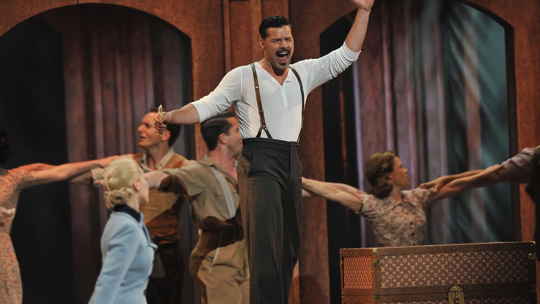 NEW YORK, NY - JUNE 10: Ricky Martin and Elena Roger of "Evita" perform onstage at the 66th Annual Tony Awards at The Beacon Theatre on June 10, 2012 in New York City. (Photo by Theo Wargo/Getty Images)