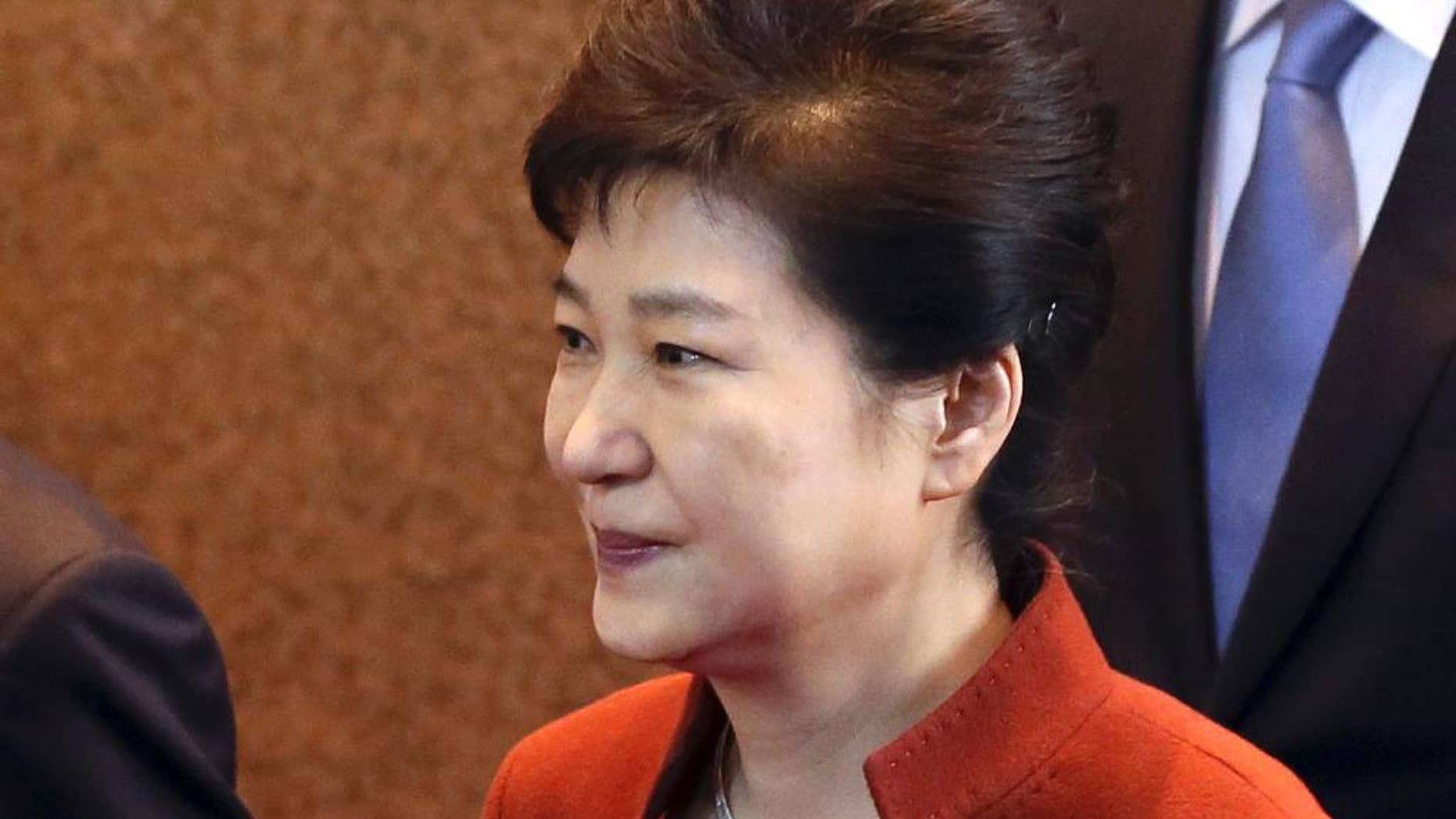 South Korean President Park Geun-hye arrives to meets with National Assembly Speaker Chung Sye-kyun at the National Assembly in Seoul, South Korea, Tuesday, Nov. 8, 2016. South Korea's president said Tuesday she will allow parliament to choose her prime minister, a major political concession to growing anger as she scrambles to defuse an escalating influence-peddling scandal. (Bae Jae-man/Yonhap via AP)