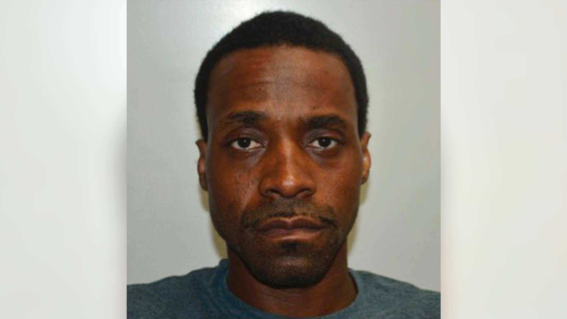 FILE - This undated photo provided by the Fresno Police Department shows Kori Ali Muhammad a suspect in the Fresno, Calif., shooting on Tuesday, April 18, 2017. The attorney for a black man charged with multiple counts of first-degree murder following a shooting rampage randomly targeting white men on the streets of Fresno said Thursday, April 27, 2017, that his client suffers from mental illness. (Fresno Police Department via AP, File)