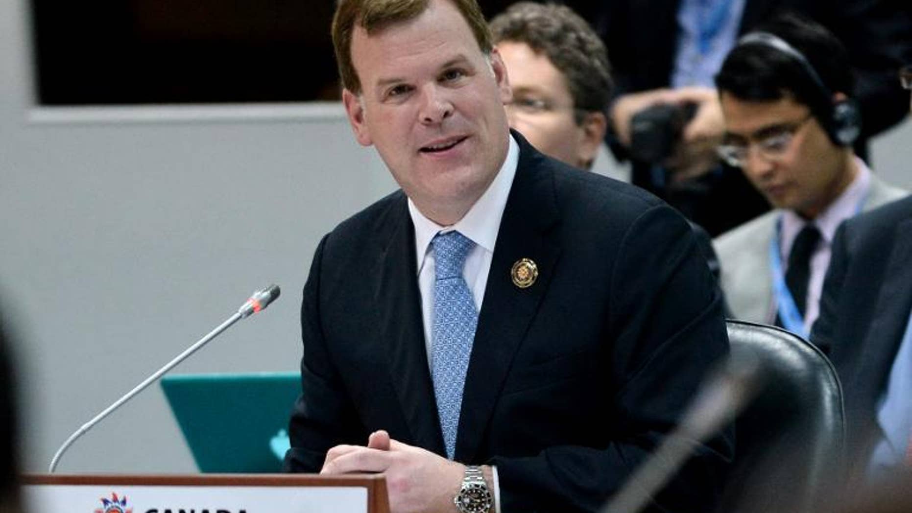 Canada Foreign Minister John Baird in Brunei on July 1, 2013