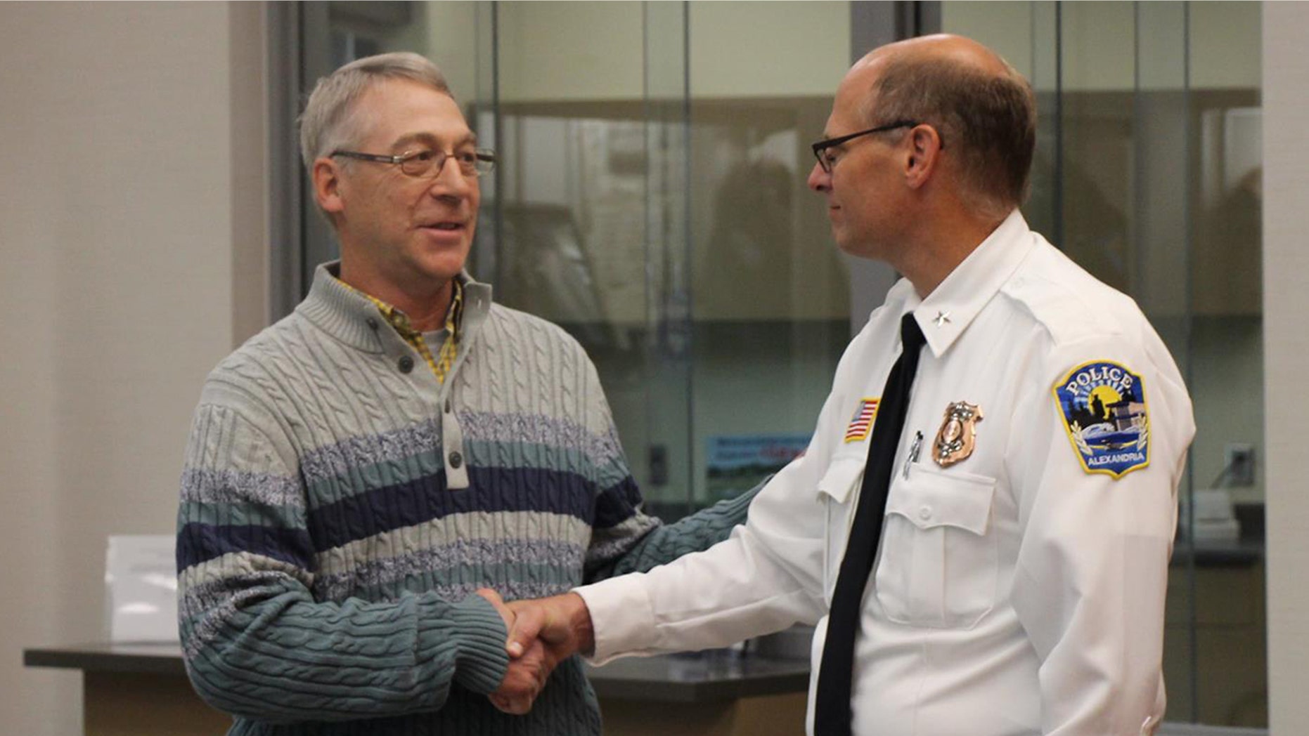 Earl Melchert, who found missing teenage girl, meets with Alexandria Police Chief Rik Wyffels.