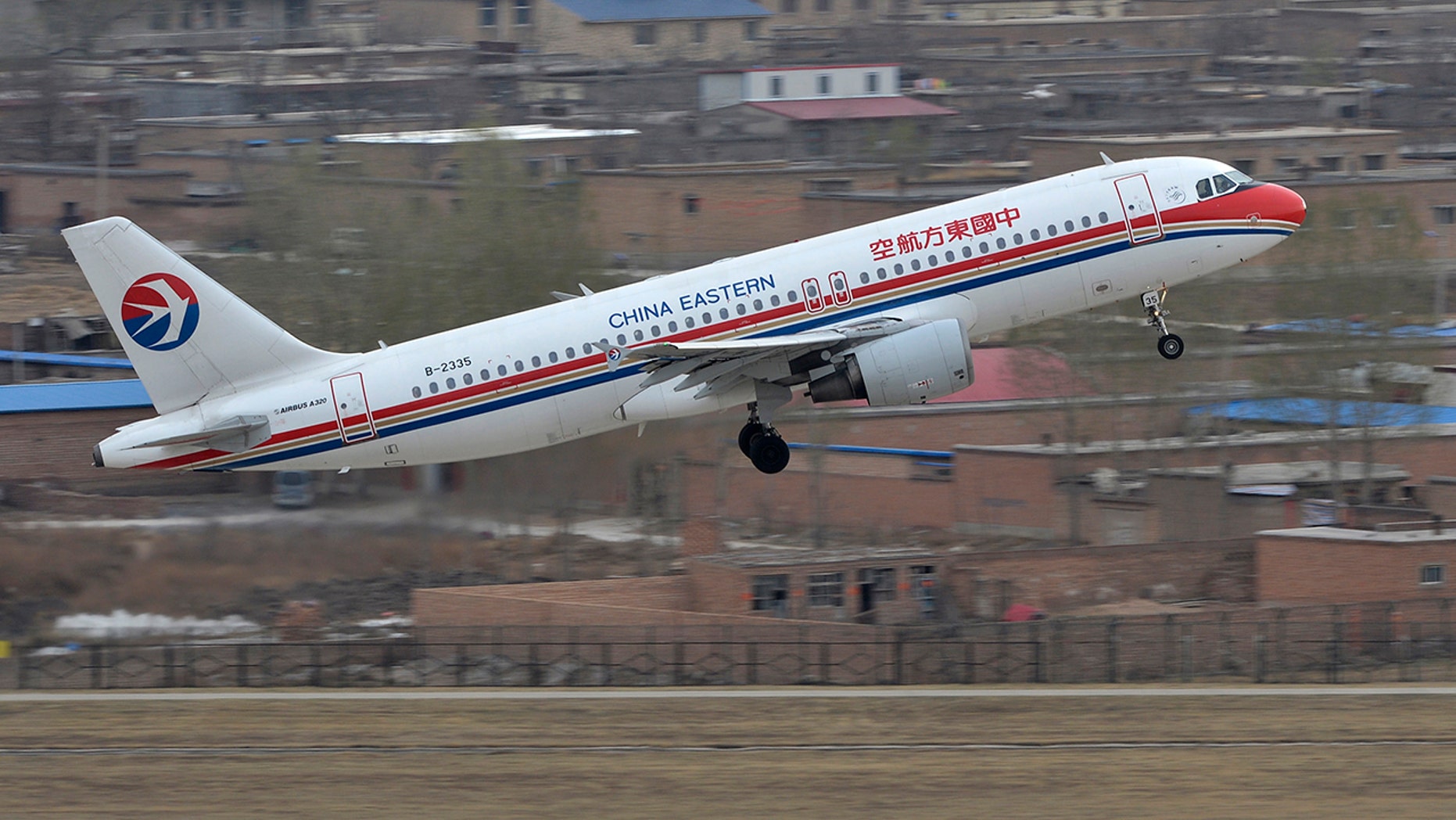 A 60-year-old woman began losing consciousness on the plane, prompting the pilot to dump fuel mid-air and make an emergency landing.