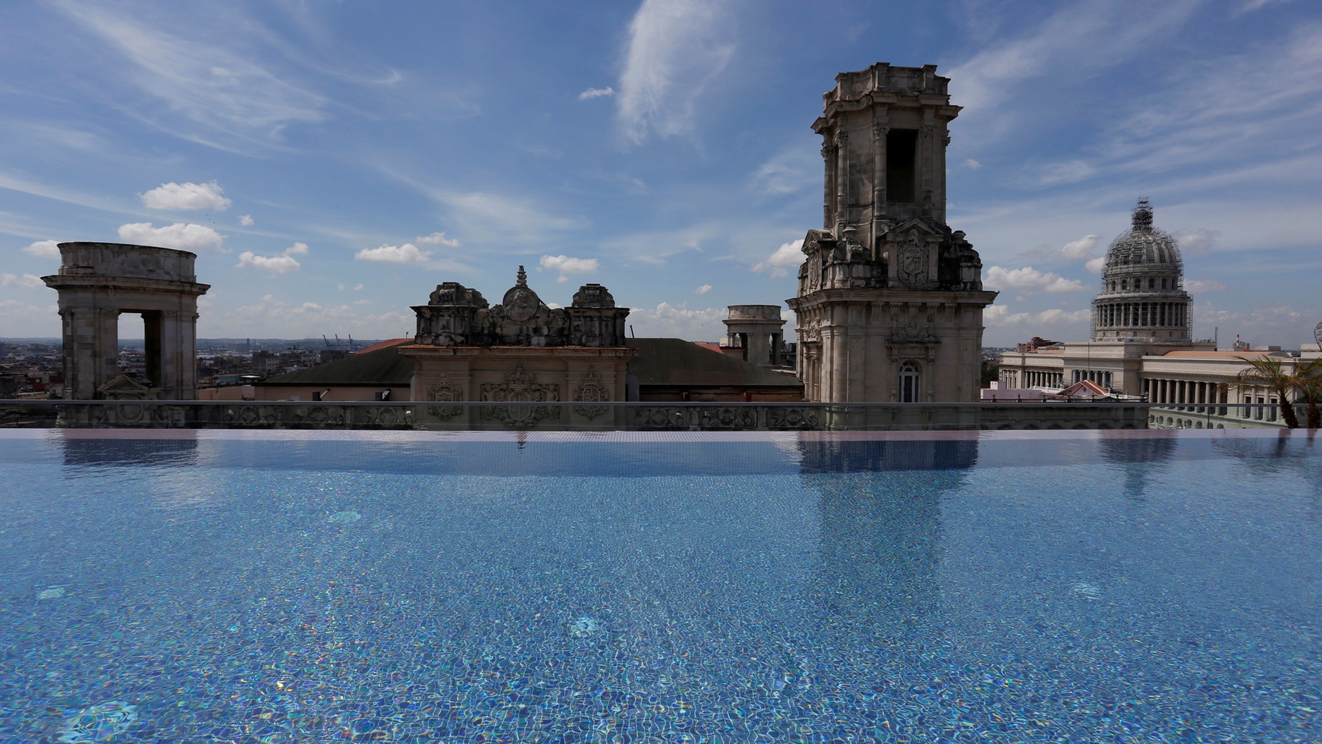 File photo: A historic building is seen from the rooftop infinity pool at the Gran Hotel Manzana, owned by the Cuban government and managed by Swiss-based Kempinski Hotels SA, in Havana, Cuba May 12, 2017. Picture taken May 12, 2017. (REUTERS/Stringer)