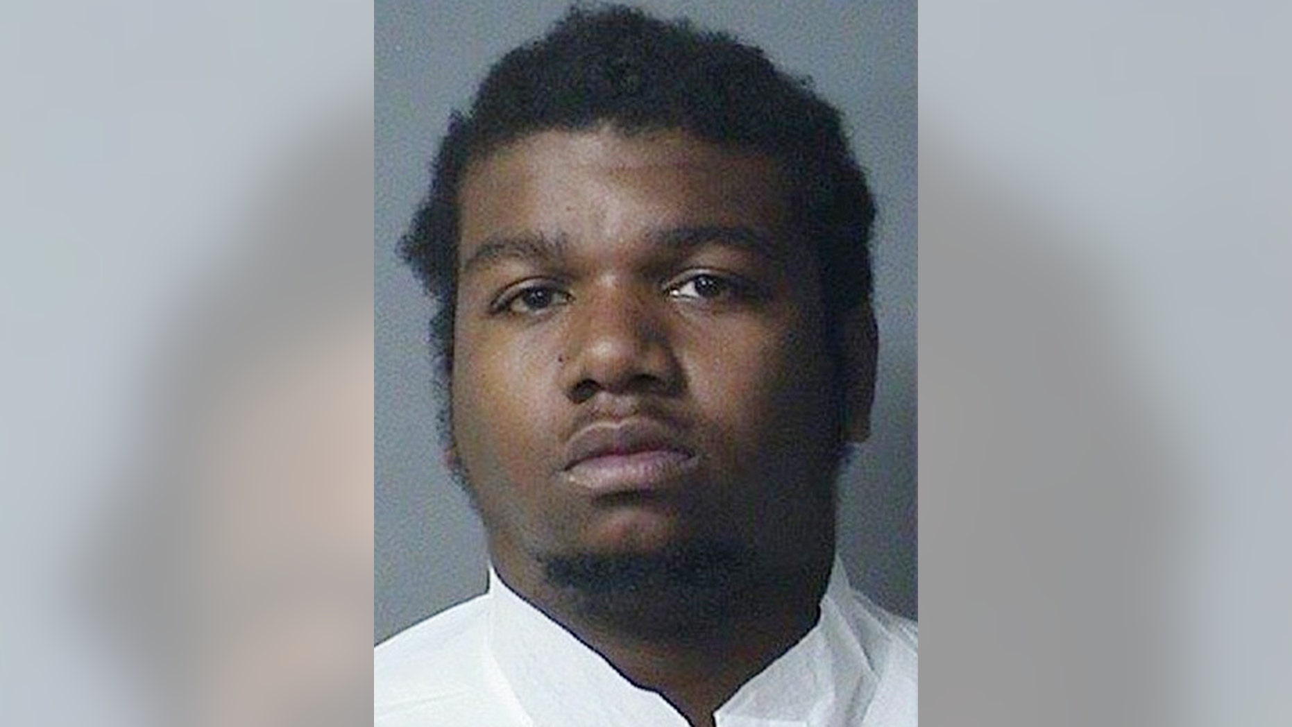 This booking photo made available by the Norfolk Police, Va., shows Rayvon A. Messer on Thursday, April 20, 2017. Authorities have charged Messer in the shooting death of his 3-year-old-son. Messer is being held without bail. (Norfolk Police via AP)
