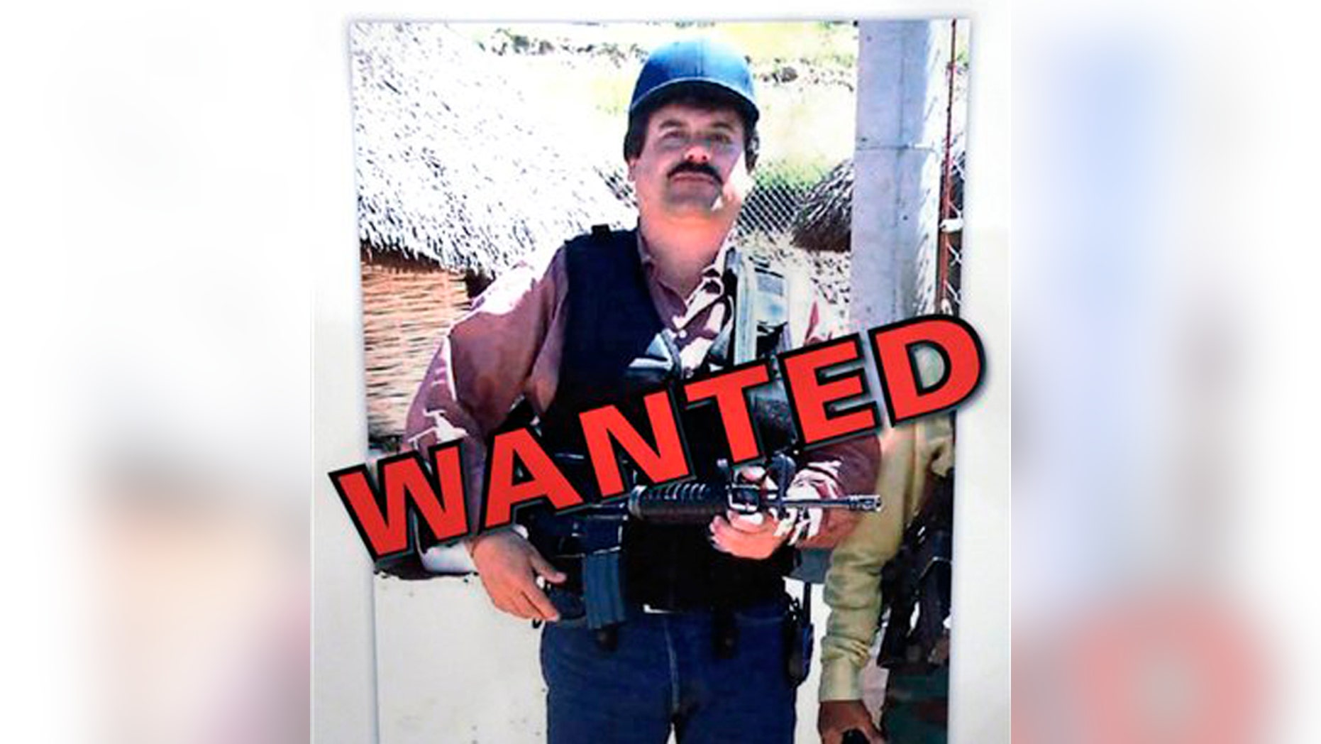 FILE - In a Thursday, Feb. 14, 2013, file photo, a poster displayed at a Chicago Crime Commission news conference in Chicago, shows Joaquin ``El Chapo'' Guzman, who was deemed Chicago's Public Enemy No. 1. In a scheme befitting a caper movie, Mexico's most powerful drug lord, Joaquin "El Chapo" Guzman, escaped late Saturday July 11, 2015 from a maximum security prison through a 1.5-kilometer (1 mile) tunnel from a small opening in the shower area of his cell, the country's top security official announced. (AP Photo/M. Spencer Green, File)