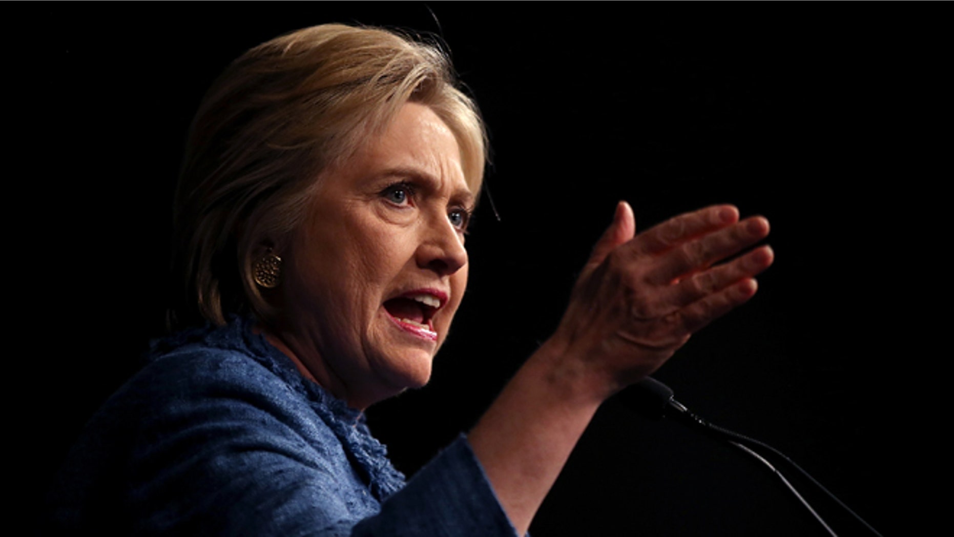 WEST PALM BEACH, FL - MARCH 15: Democratic presidential candidate former Secretary of State Hillary Clinton speaks during her primary night gathering on March 15, 2016 in West Palm Beach, Florida. Hillary Clinton defeated rival U.S. Sen. Bernie Sanders in the Florida, Ohio and North Carolina primaries. (Photo by Justin Sullivan/Getty Images)