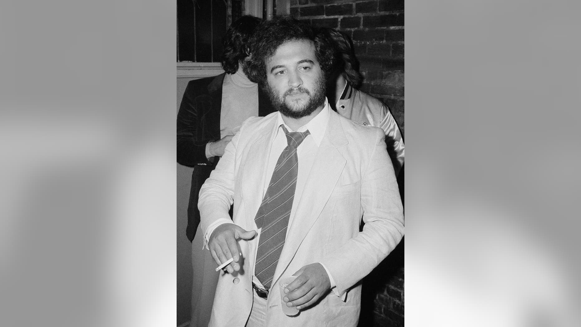 John Belushi's death is mentioned in a new book, "The Castle on Sunset."