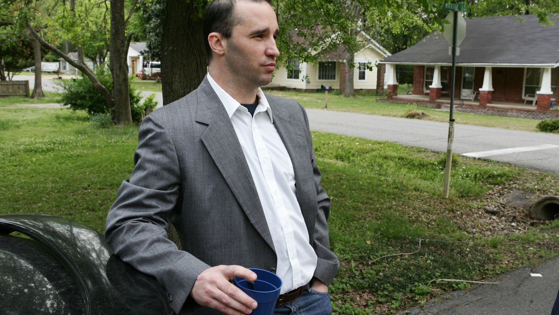 FILE - In this Tuesday April 23, 2013, file photo, James Everett Dutschke stands in the street near his home in Tupelo, Miss. A change-of-plea hearing is scheduled for Dutschke a man charged with sending poison-laced letters to President Barack Obama and other officials. James Everett Dutschke is scheduled for a hearing in U.S. District Court in Oxford on Friday afternoon, Jan. 17, 2014 according to court documents. (AP Photo/Northeast Mississippi Daily Journal, Thomas Wells, File) MANDATORY CREDIT
