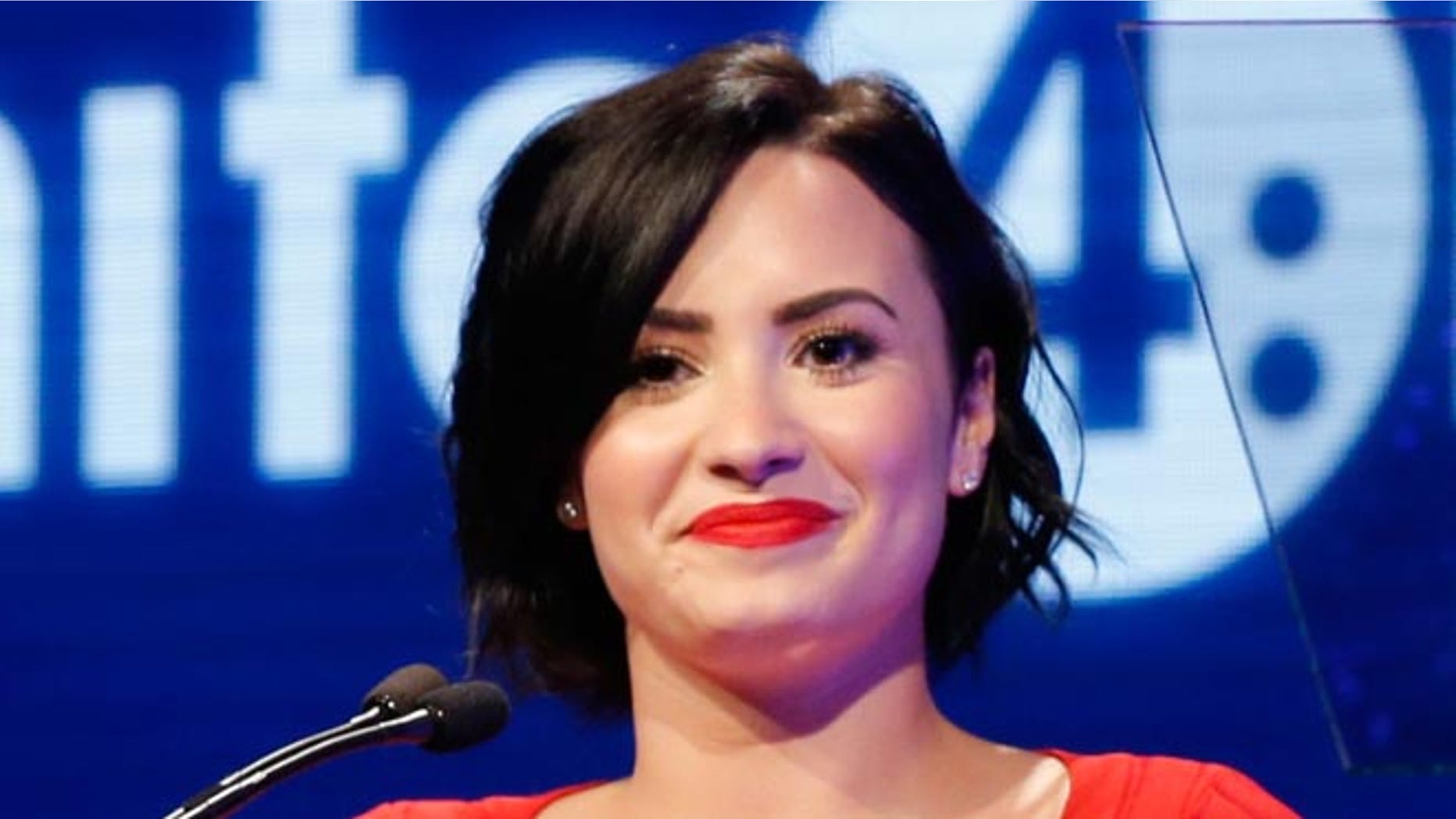 LOS ANGELES, CA - FEBRUARY 19: Presenter Demi Lovato speaks onstage at the 2nd Annual unite4:humanity presented by ALCATEL ONETOUCH at the Beverly Hilton Hotel on February 19, 2015 in Los Angeles, California. (Photo by Joe Scarnici/Getty Images for Variety)