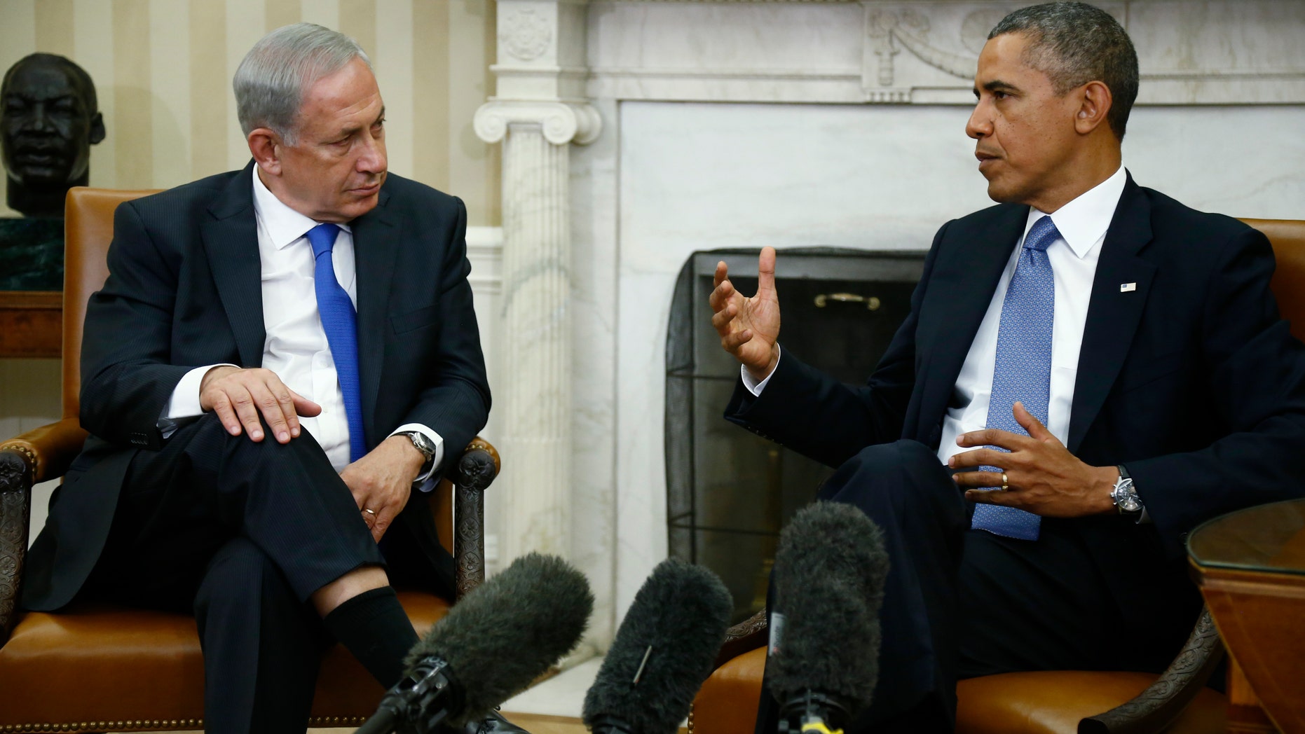 File - In this Sept. 30, 2013, file photo, President Barack Obama meets with Israeli Prime Minister Benjamin Netanyahu in the Oval Office at the White House in Washington. The U.S. and Iran secretly engaged in high-level, face-to-face talks, at least three times over the past year, in a high stakes diplomatic gamble by the administration that paved the way for the historic deal aimed at slowing Iran's nuclear program. After the Sept. 27, phone call between Obama and Iranian president Hassan Rouhani, the U.S. began informing allies about the talks. Obama handled the most sensitive conversation himself, briefing Netanyahu during his Sept. 30 visit to the White House. Israel remains furious about the agreement. (AP Photo/Charles Dharapak)