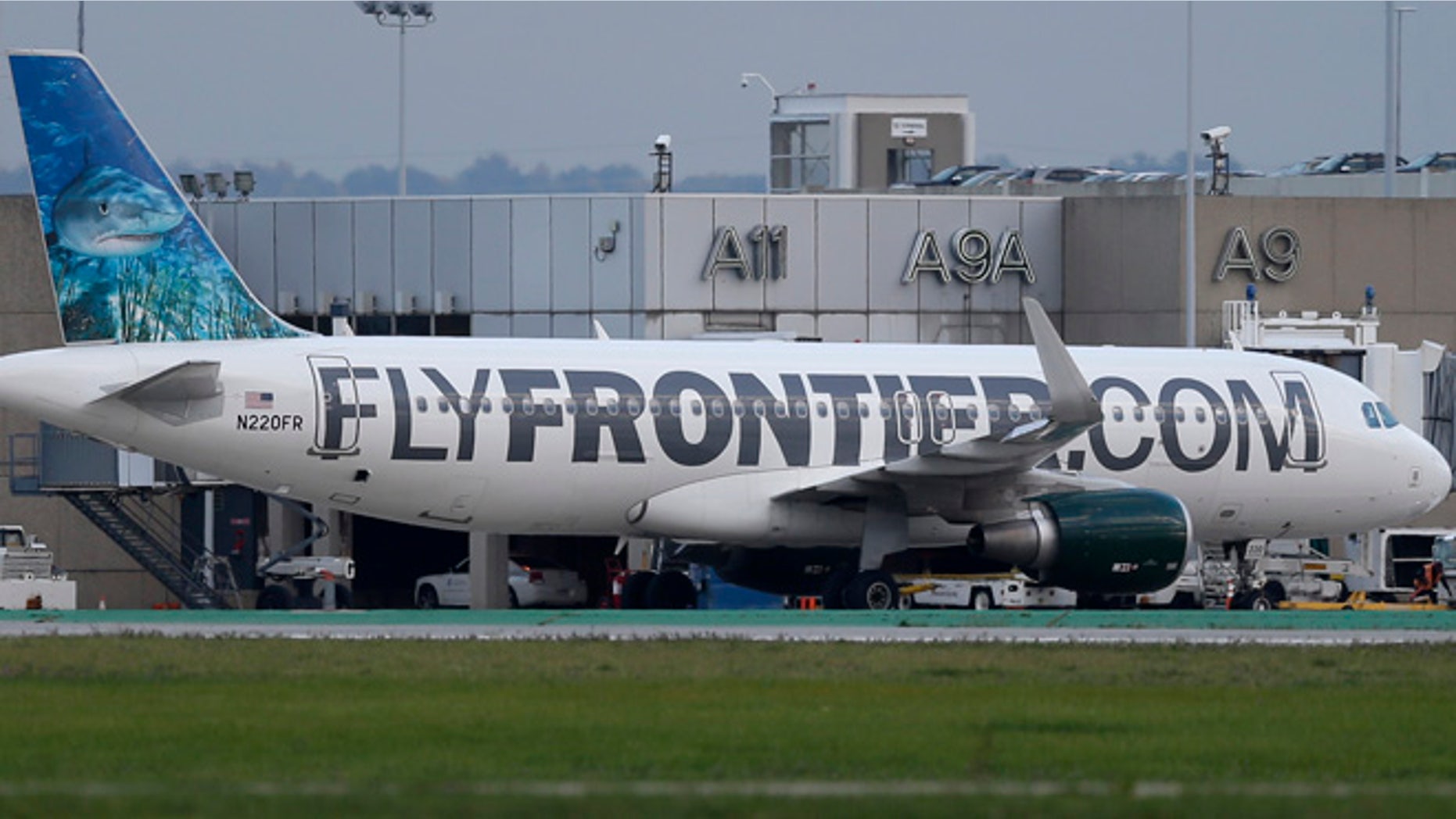 Oct. 15, 2014: The Frontier Airlines plane that Amber Vinson flew from Cleveland to Dallas on Monday, taxies away from the terminal at Cleveland Hopkins International Airport in Cleveland.