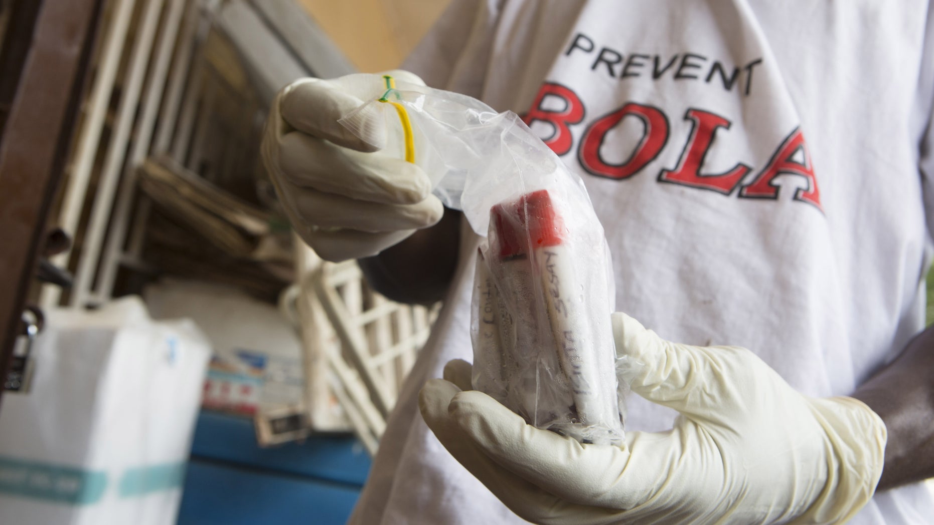 Blood samples from patients suspected of having the Ebola virus disease are prepared for transportation to Freetown for testing, at the Port Loko District Hospital September 27, 2014. REUTERS/Christopher Black/WHO/Handout via Reuters