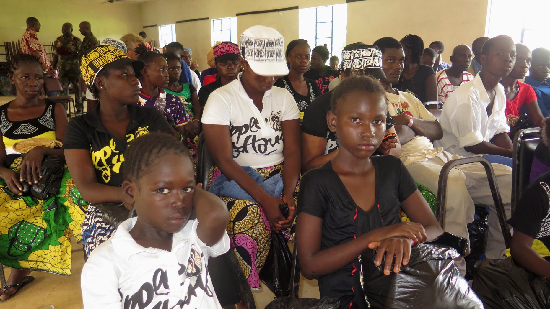 Survivors of the Ebola outbreak attend a discharging ceremony at a health clinic in Freetown October 6, 2014. REUTERS/Umaru Fofana