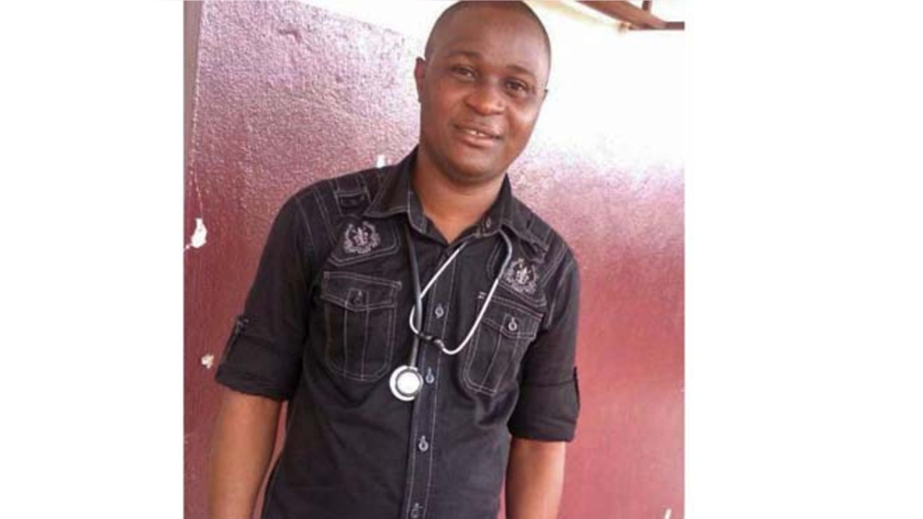 Dec. 1, 2014: Ebola virus survivor Doctor Komba Songu-Mbriwa poses for a photo at the Hastings Ebola Treatment Centre on the outskirts of the capital city of Freetown, Sierra Leone. (AP)