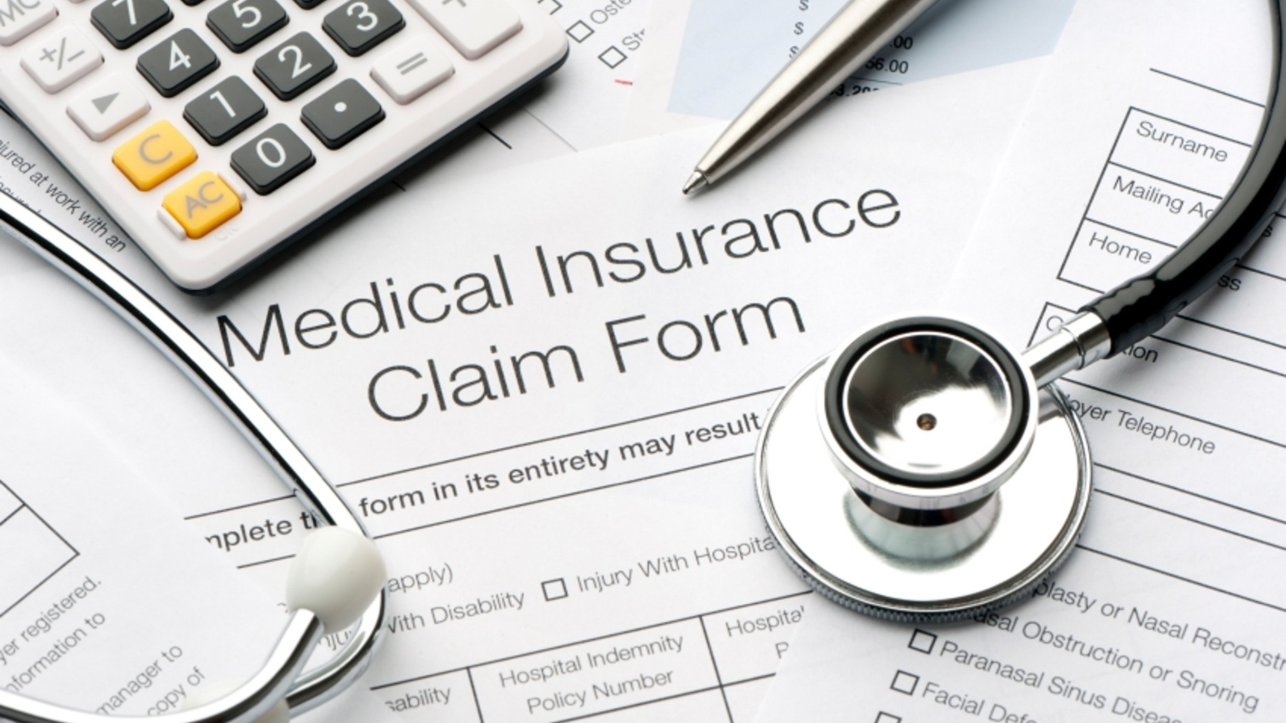 Close up of a medical insurance form with stethoscope