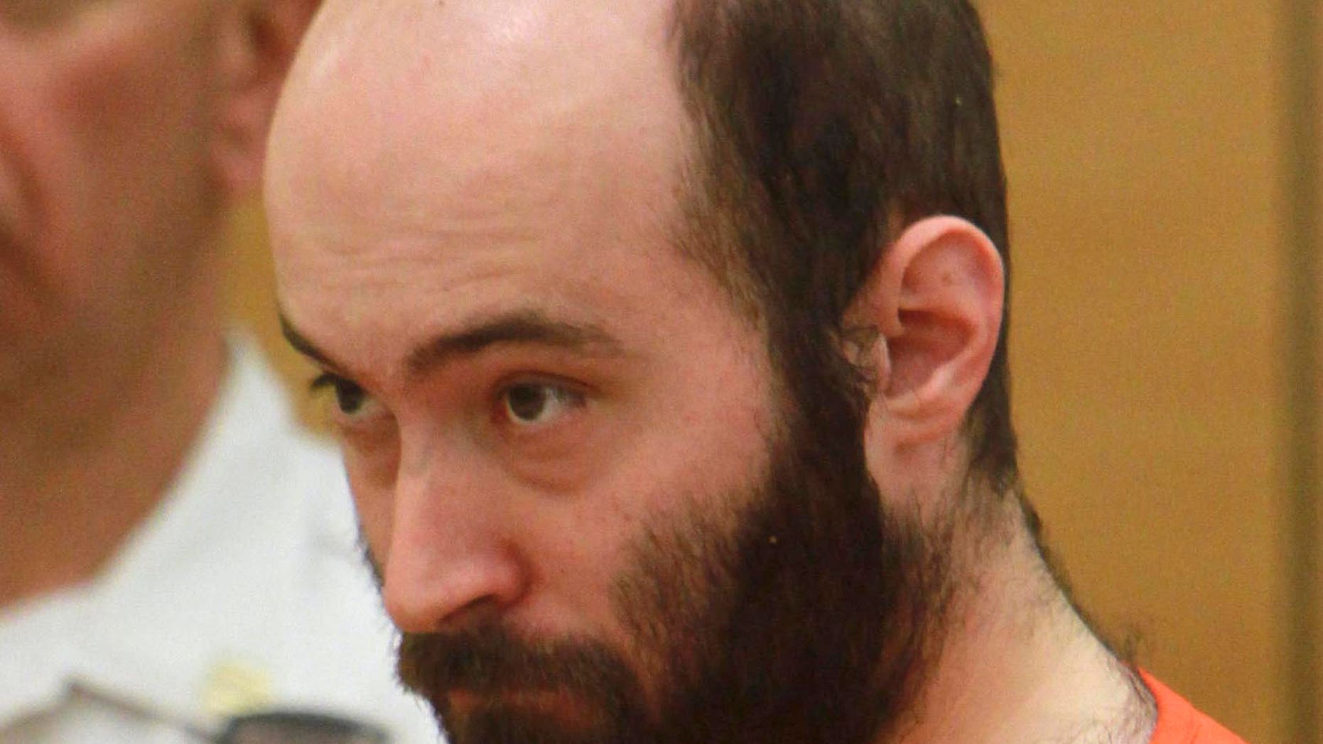 Levi Aron, accused of abducting and dismembering eight-year-old boy Leiby Kletzky, is arraigned in Brooklyn criminal court in New York in 2011.