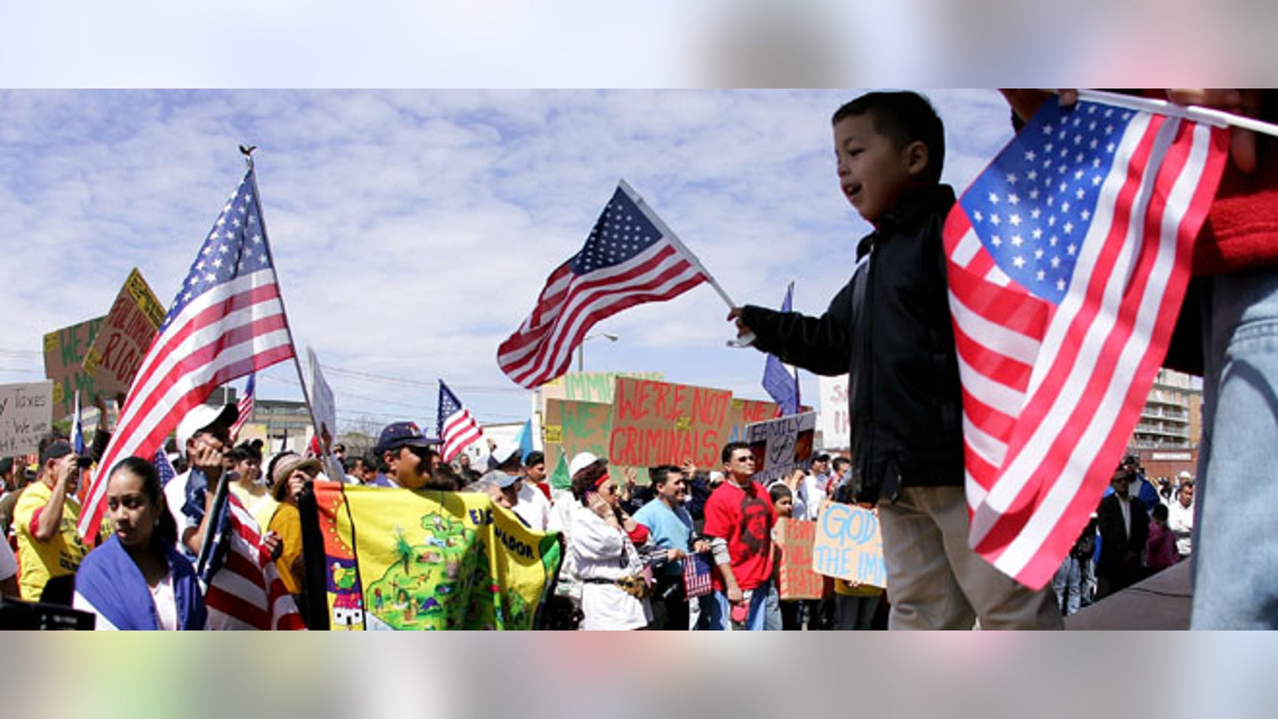 HEMPSTEAD, NY - MAY 1: Immigration demonstrators gathered for a rally at Hempstead Village Hall as part of the "Day Without Immigrants" national protest May 1, 2006 in Hempstead, New York. On October 27, 2011, a report that immigrants, including Latinos, are thriving on Long Island. (Photo by John Dunn/Getty Images)