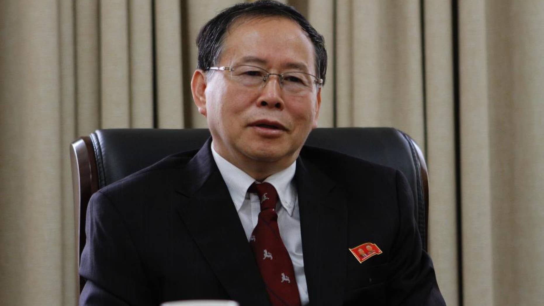 Han Song Ryol, director-general of the U.S. affairs department at North Korea's Foreign Ministry, talks during an interview with the Associated Press in Pyongyang, North Korea, Thursday, July 28, 2016. Han said that Washington "crossed the red line" and effectively declared war by putting leader Kim Jung Un on its list of sanctioned individuals and said a vicious showdown could erupt if the U.S. and South Korea hold annual war games as planned next month. (AP Photo/Kim Kwang Hyon)