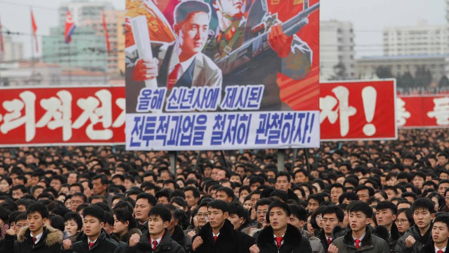North Koreans gather during a mass rally to vow to carry through the tasks set forth by North Korean leader Kim Jong Un in his New Year's address, at Kim Il Sung Square in Pyongyang, North Korea Thursday, Jan. 5, 2017. (AP Photo/Jon Chol Jin)