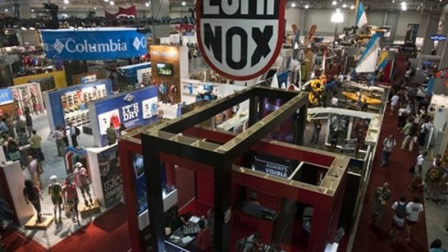FILE: In this Aug. 4, 2010 photo, people walk around exhibitors during the Outdoor Retailer Summer Market at the Salt Palace Convention Center in Salt Lake City, Utah. Despite an economy hammered by recession, sales have doubled every year for a tiny New Hampshire company that makes tents.