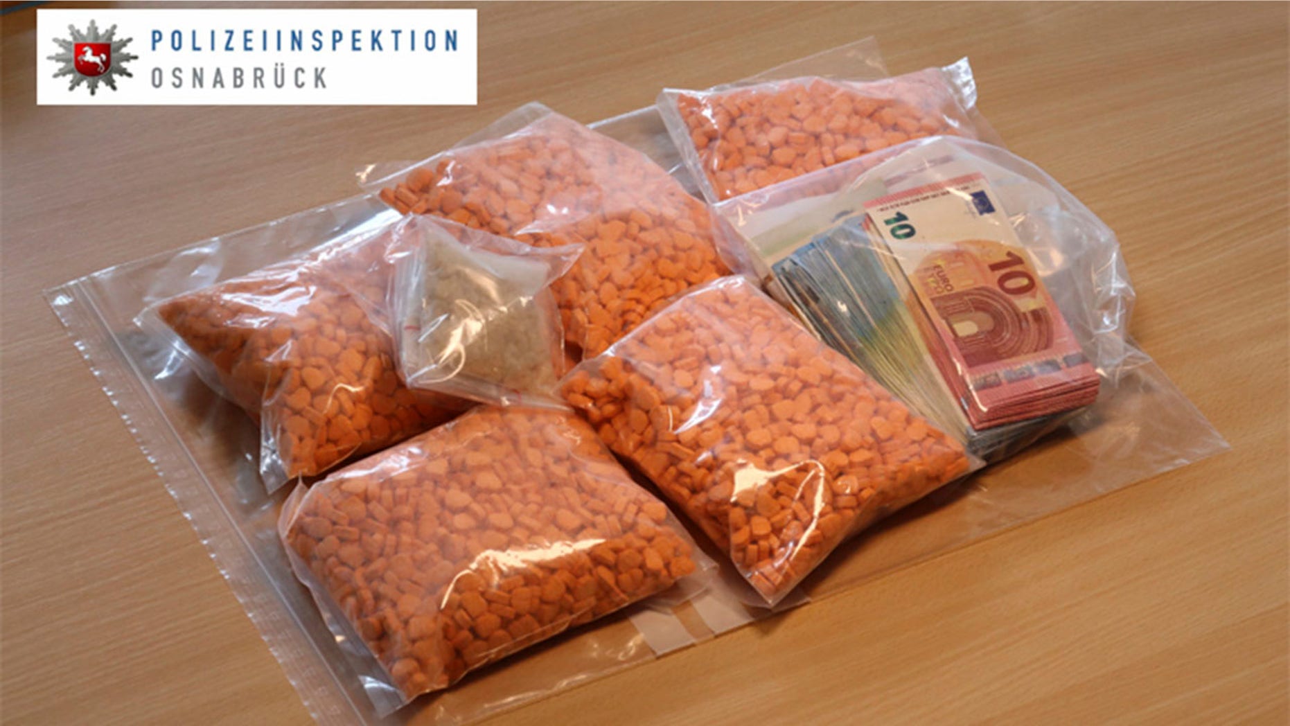 In this undated picture provided by the Osnabrueck , Germany, police department, ecstacy pills are on display. German police say they have seized thousands of ecstasy pills in the shape of President Donald Trumpâs head, a haul with an estimated street value of 39,000 euros ($45,900). Police in Osnabrueck, in northwestern Germany, say they found the drugs during a check Saturday Aug. 19, 2017 on an Austrian-registered car on the A30 highway. (Osnabrueck police via AP)