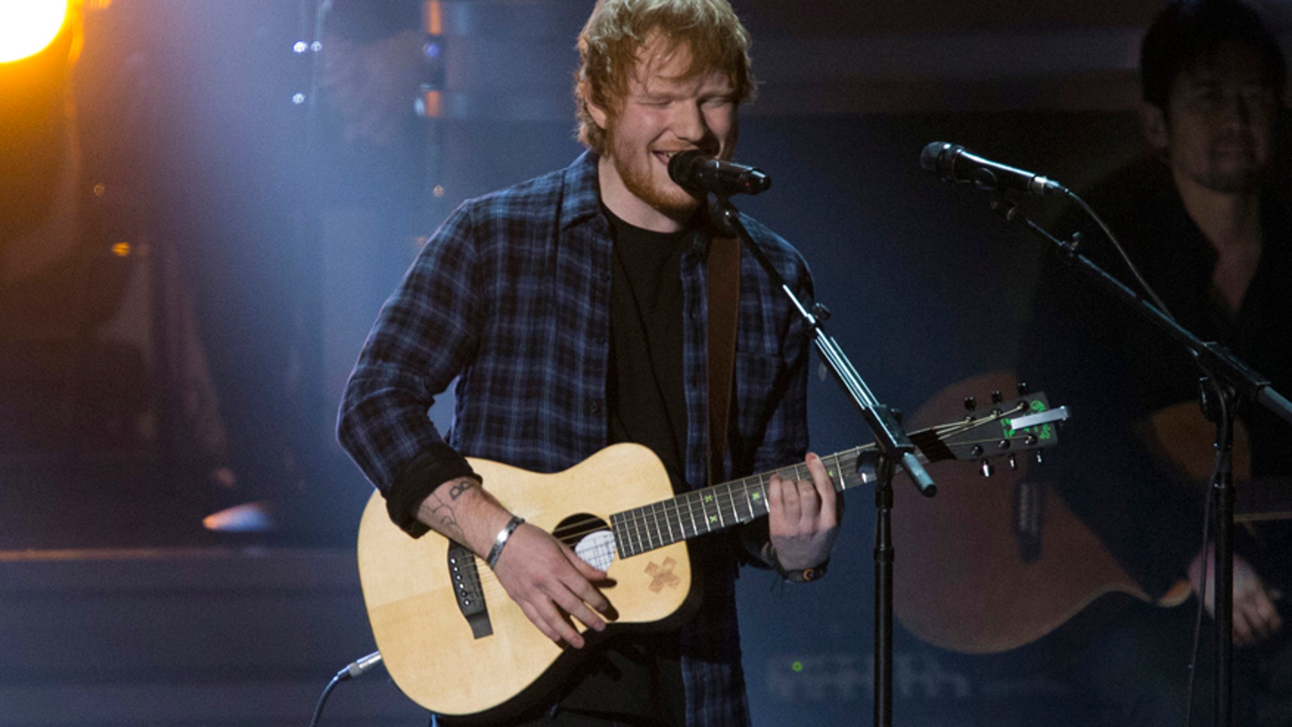 British singer Ed Sheeran performs "I Was Made To Love Her" during the taping of "Stevie Wonder: Songs In The Key Of Life - An All-Star GRAMMY Salute" concert at the Nokia Theatre in Los Angeles, California February 10, 2015.