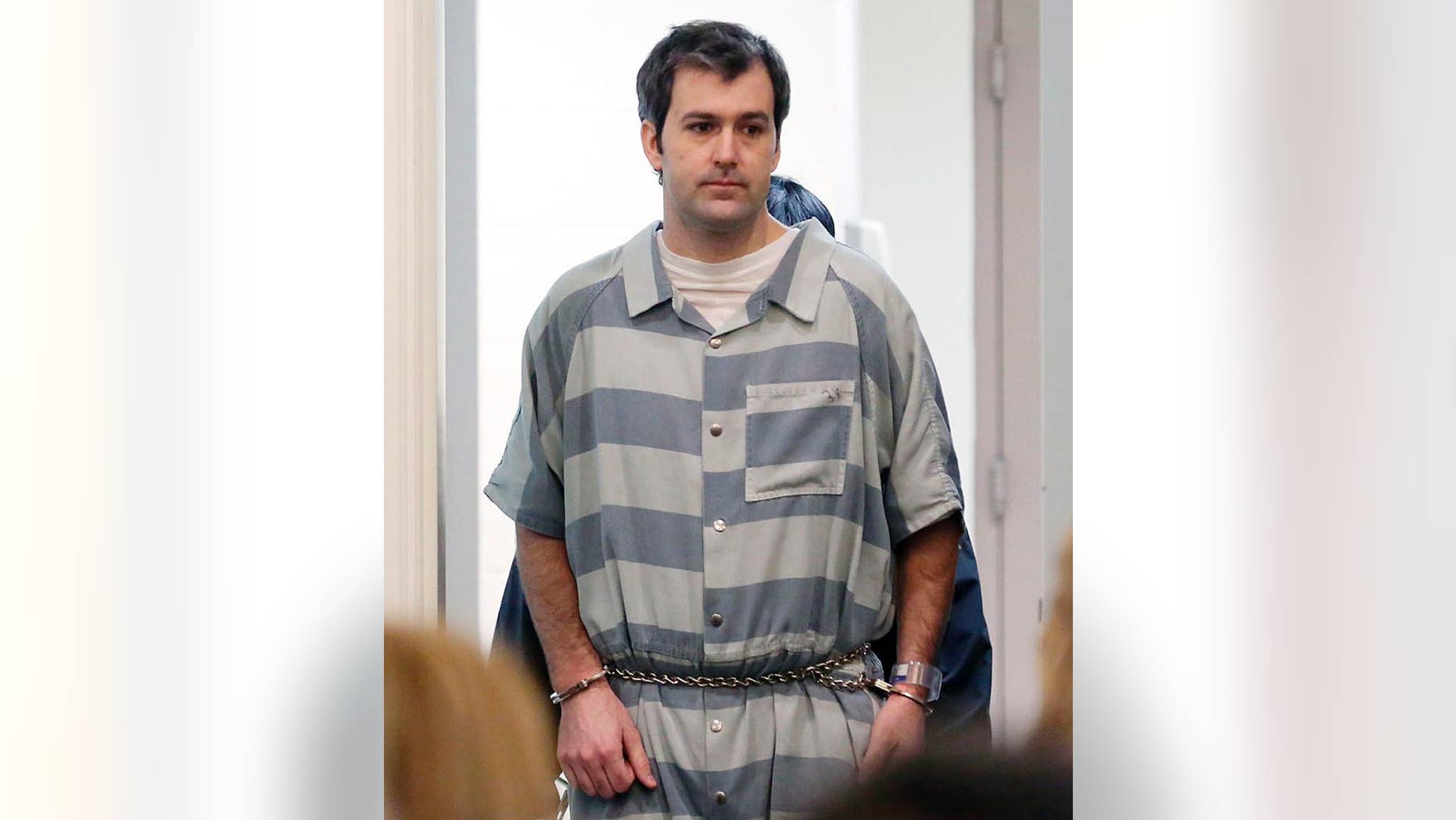 FILE - In a Thursday, Sept. 10, 2015 file photo, former North Charleston police office Michael Slager, is lead into court, in Charleston, S.C. Attorneys for Slager filed a motion Tuesday, Oct. 18, 2016 to have his trial moved out of Charleston, saying a survey found 85 percent of people in Charleston County had seen bystander video of the North Charleston officer shooting Walter Scott in April 2015. They say the video doesn’t show the entire confrontation and potential jurors who have viewed the video might not be able to also fairly consider their evidence. (Grace Beahm/The Post And Courier via AP, File)