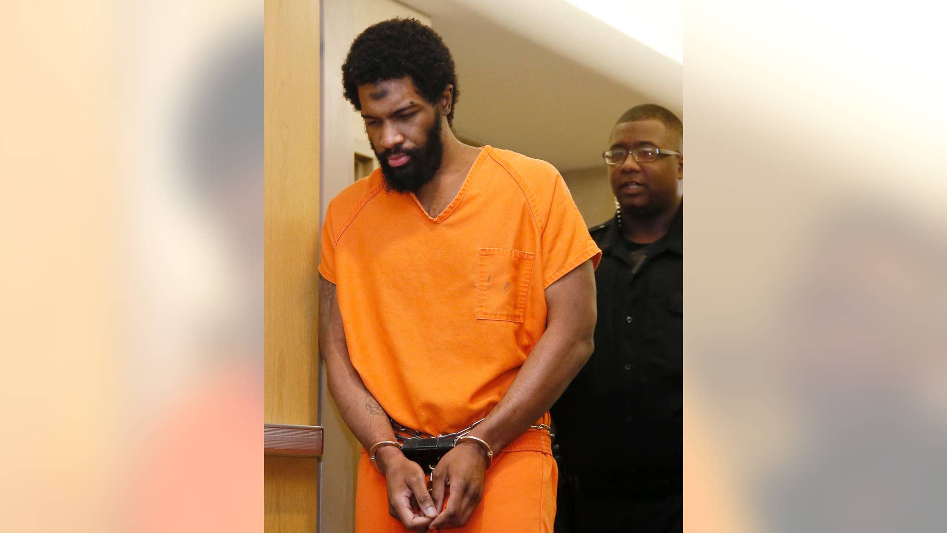 Alton Nolen is led into an Oklahoma courtroom.