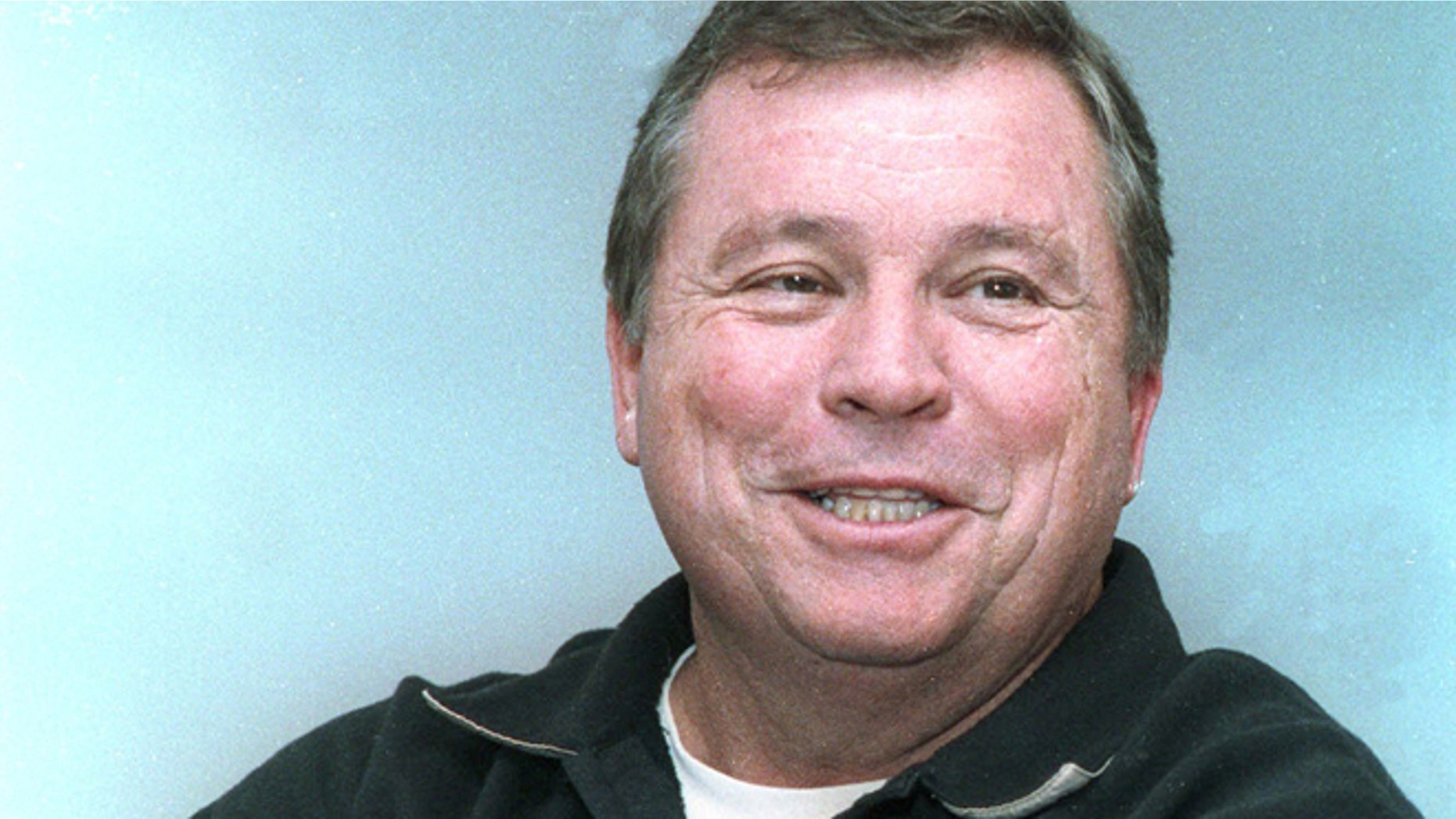 This Oct. 22. 1991, file photo shows actor Tom "Billy Jack" Laughlin talking with residents at Eastern Depot Restaurant in Berlln, N.H. Laughlin, whose production and marketing of "Billy Jack" set a standard for breaking the rules on and off screen, has died.