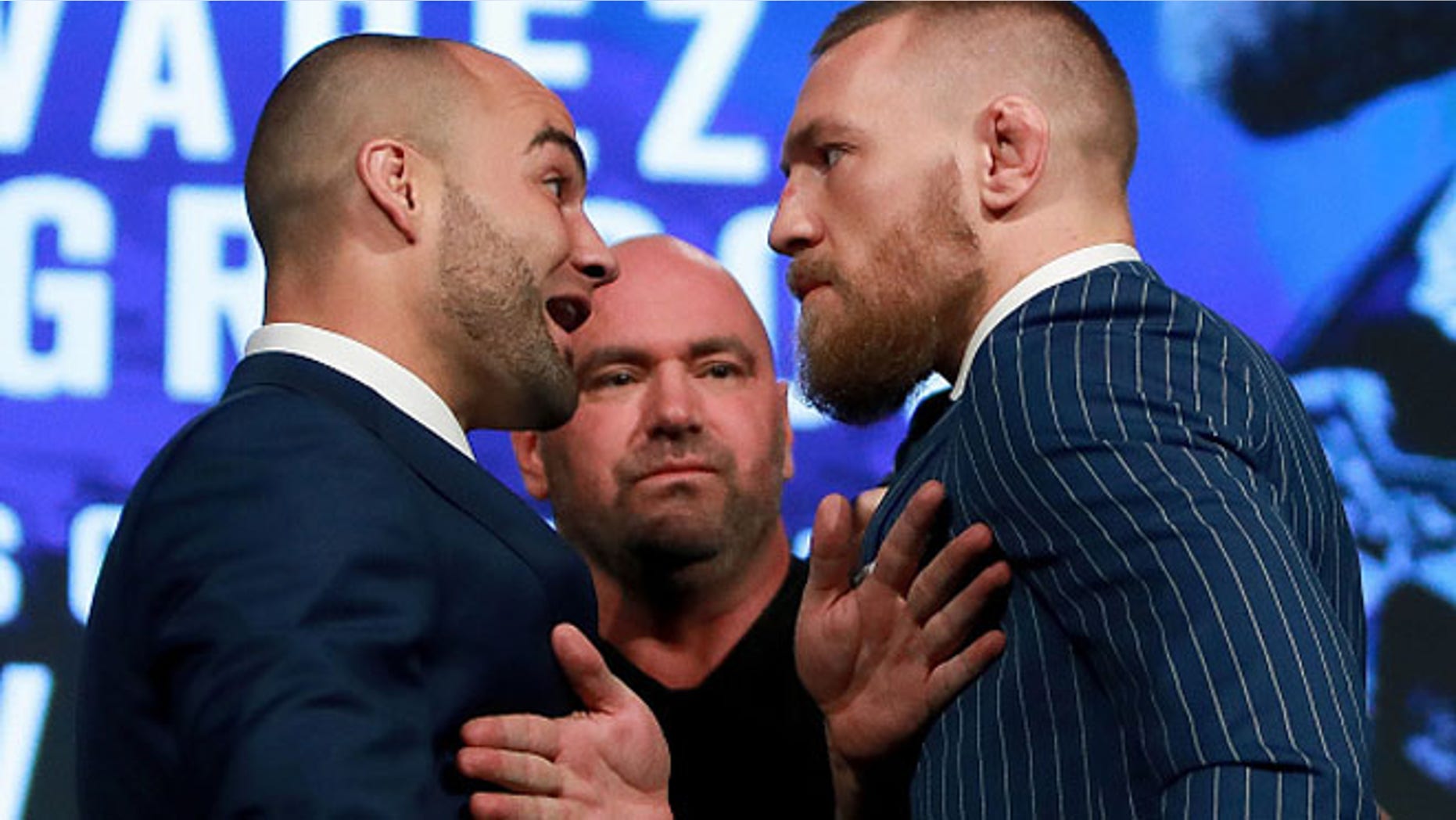 Conor McGregor and Eddie Alvarez face-off at the UFC 205 press conference on September 27, 2016.
